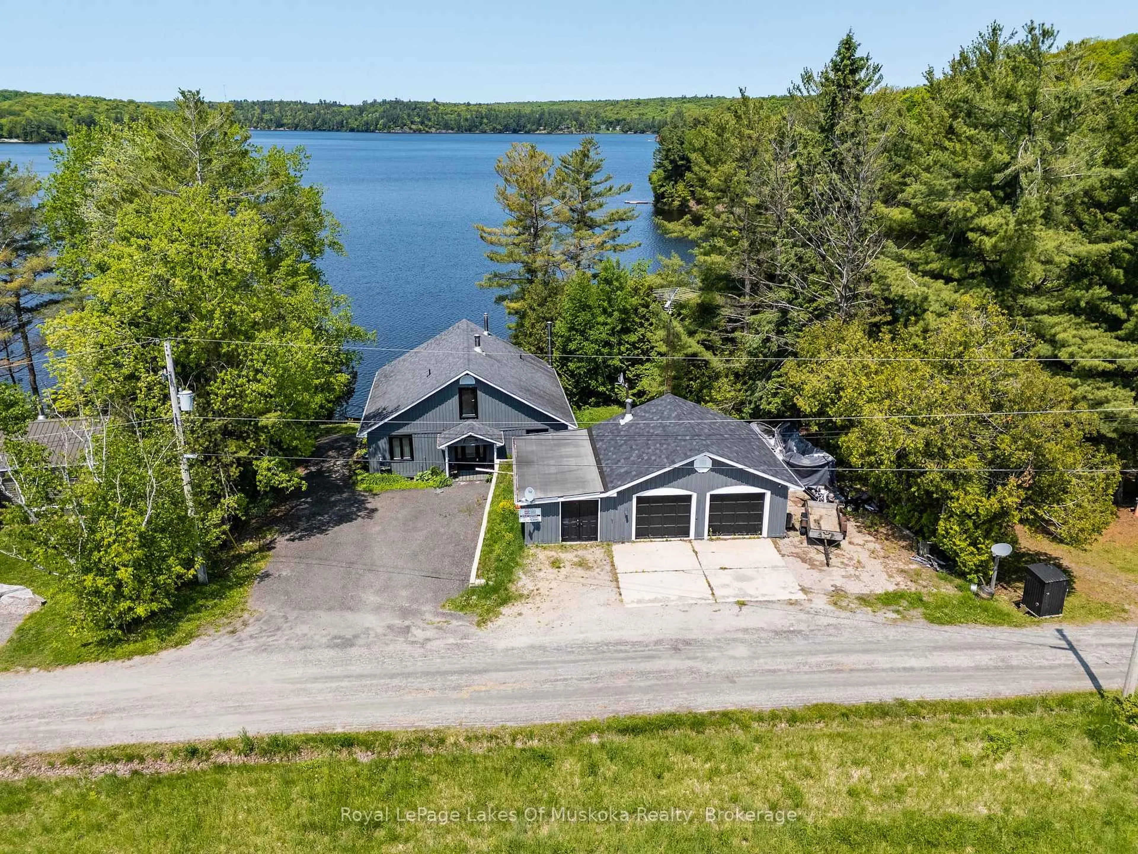 A pic from outside/outdoor area/front of a property/back of a property/a pic from drone, water/lake/river/ocean view for 1378 Three Mile Lake Rd #3, Muskoka Lakes Ontario P0B 1M0