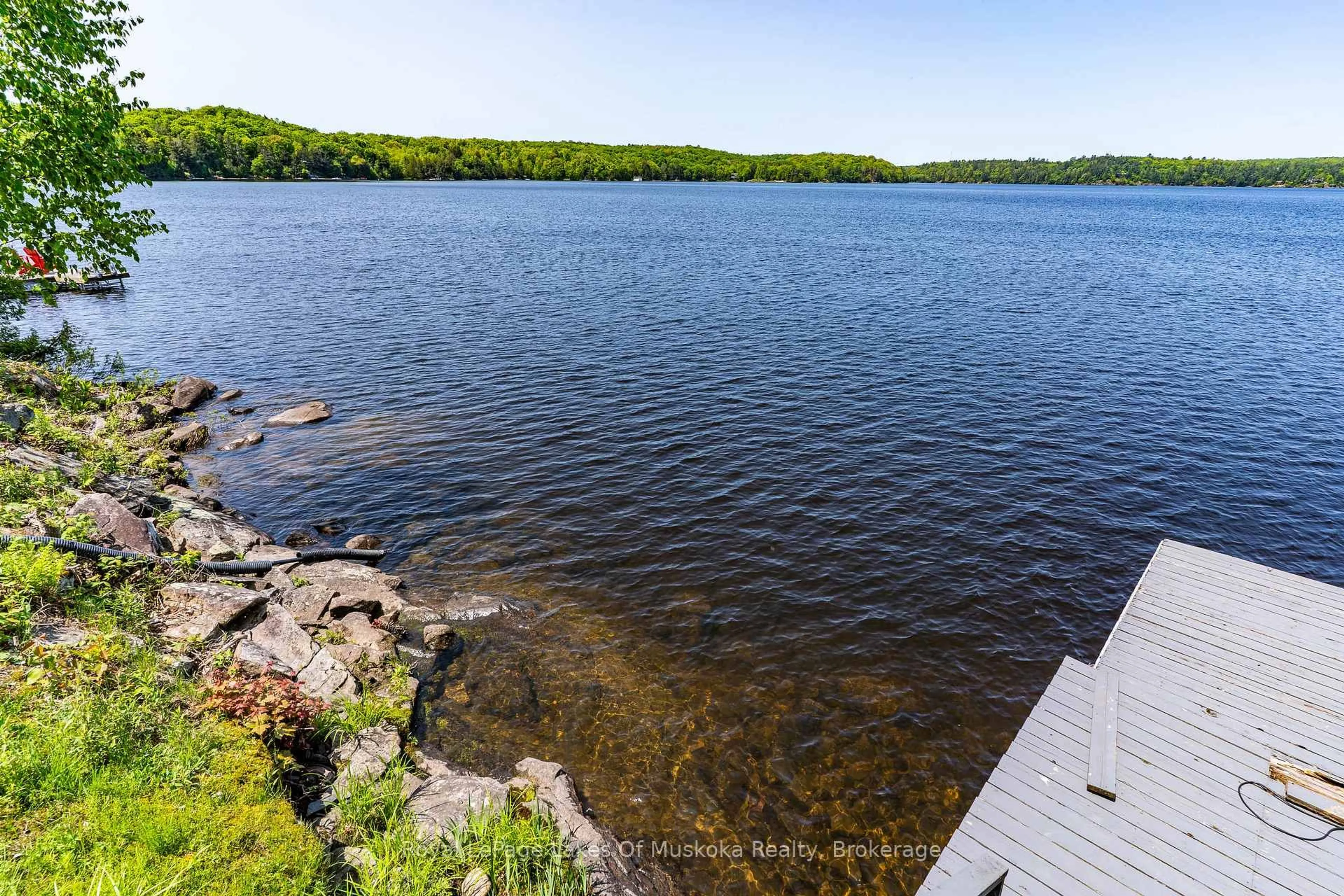 A pic from outside/outdoor area/front of a property/back of a property/a pic from drone, water/lake/river/ocean view for 1378 Three Mile Lake Rd #3, Muskoka Lakes Ontario P0B 1M0