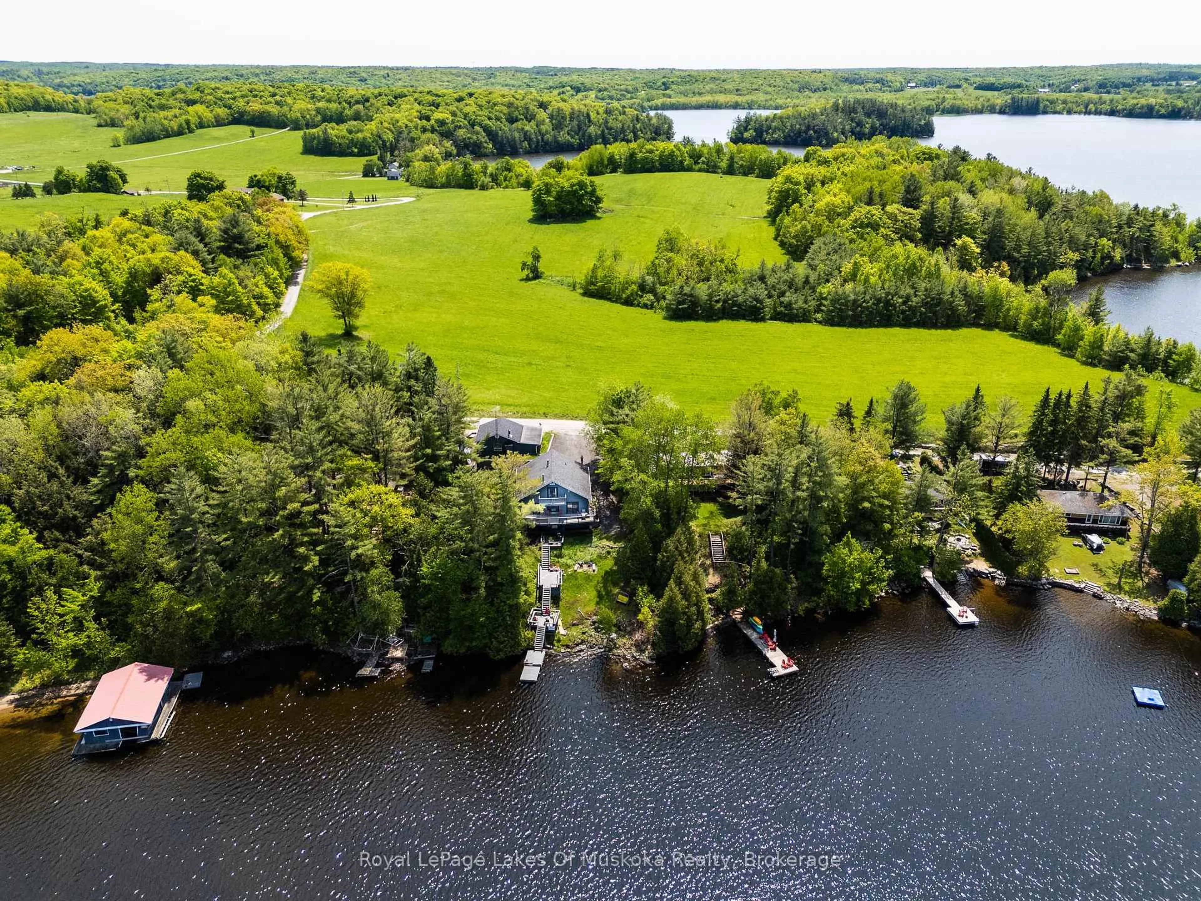 A pic from outside/outdoor area/front of a property/back of a property/a pic from drone, water/lake/river/ocean view for 1378 Three Mile Lake Rd #3, Muskoka Lakes Ontario P0B 1M0