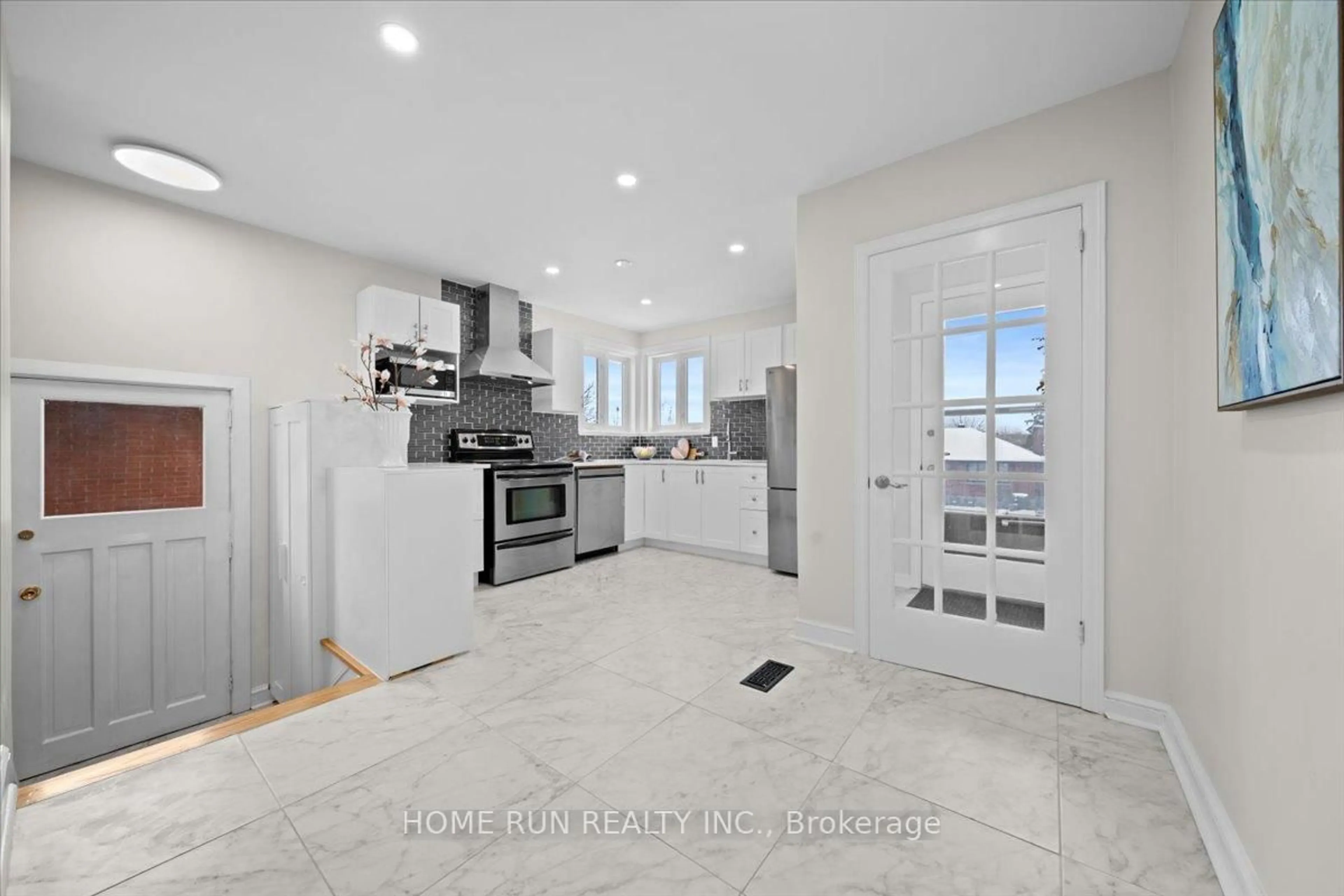 Open concept kitchen, ceramic/tile floor for 841 Iroquois Rd, Ottawa Ontario K2A 3N3
