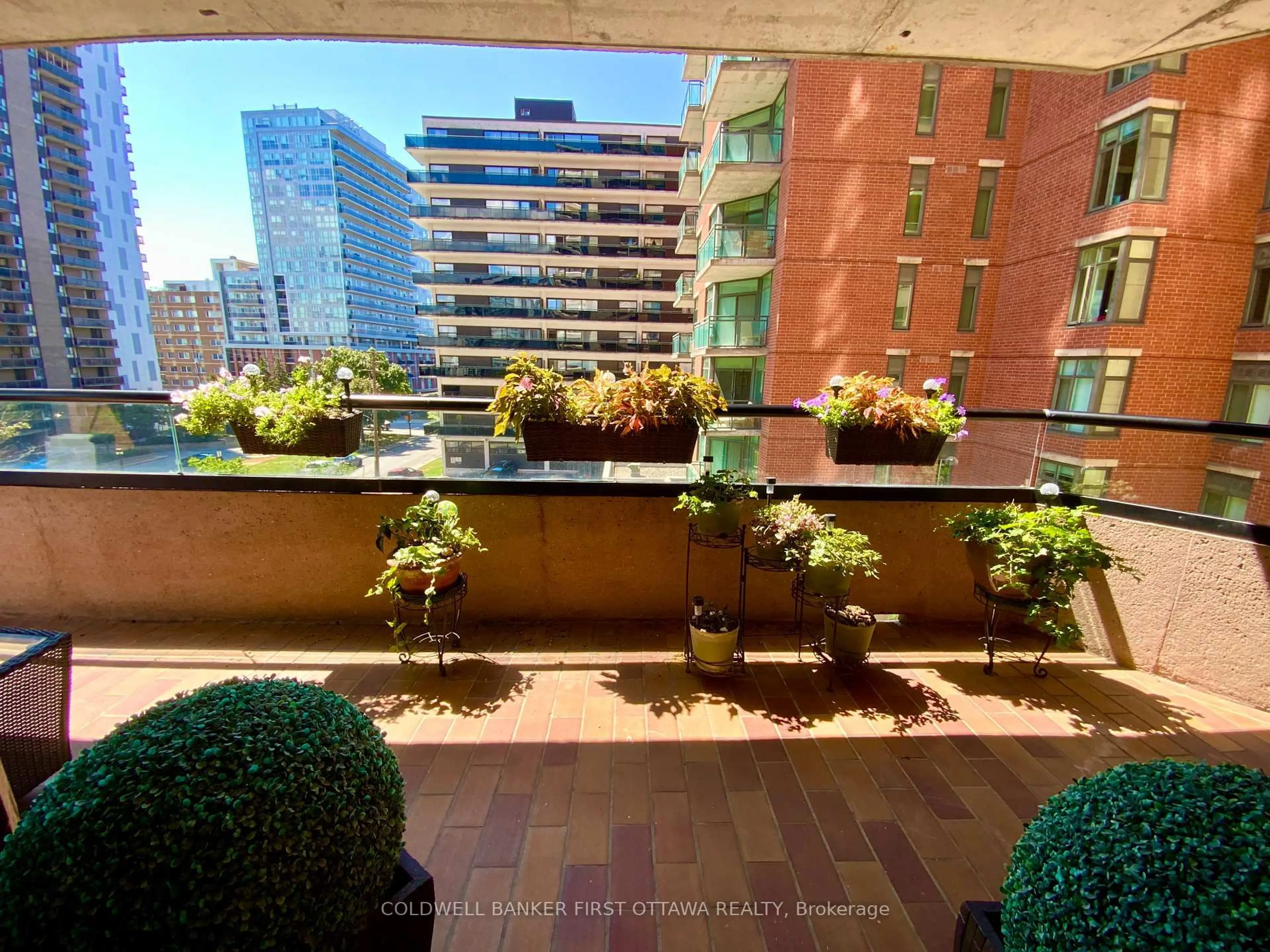 Balcony in the apartment, city buildings view from balcony for 556 Laurier Ave #506, Ottawa Ontario K1R 7X2