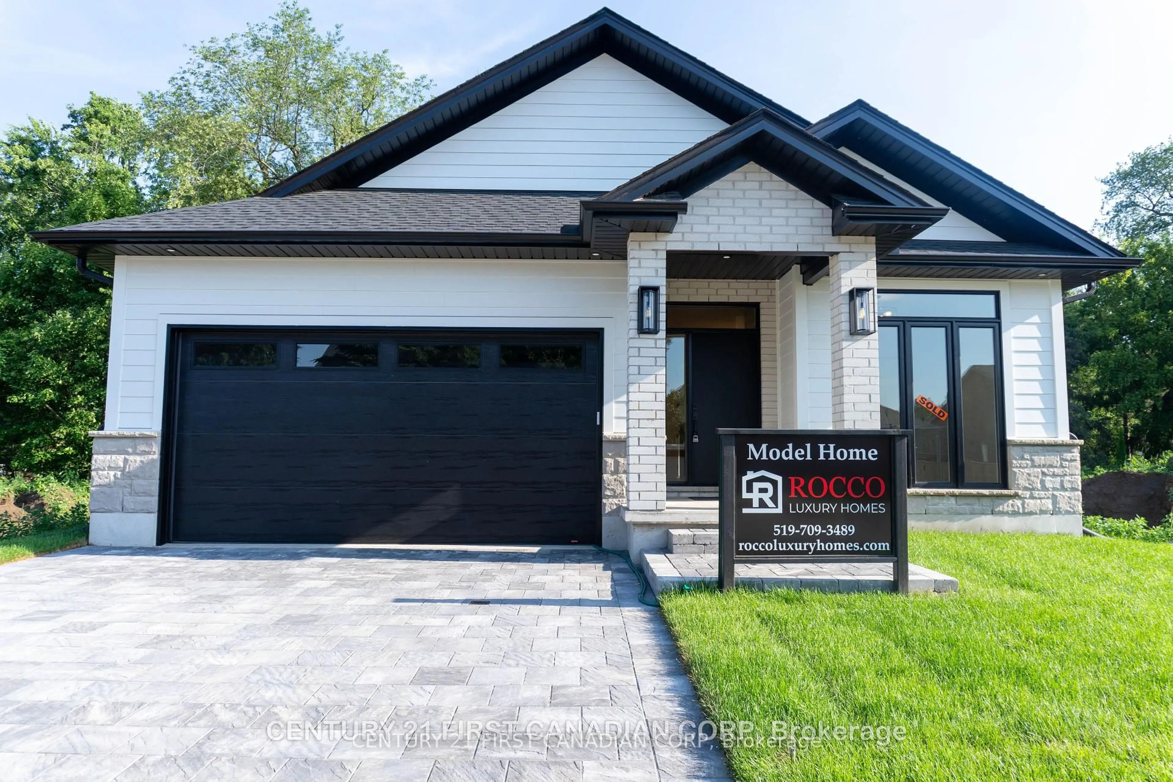 Home with vinyl exterior material, street for 430 Head St #16, Strathroy-Caradoc Ontario N7G 2K2