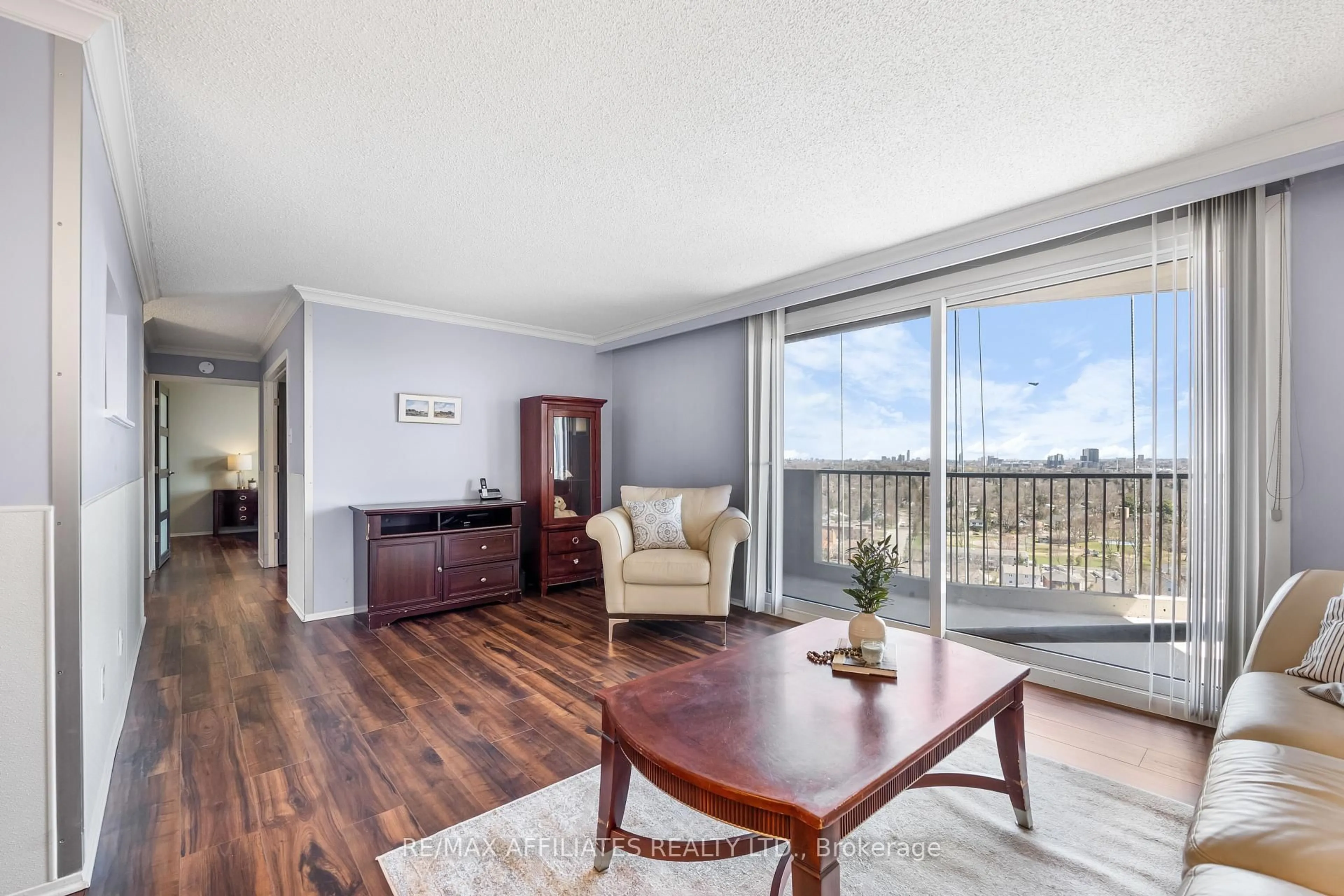 Living room with furniture, wood/laminate floor for 1025 RICHMOND RD  #2305 Rd, Ottawa Ontario K2B 8G8