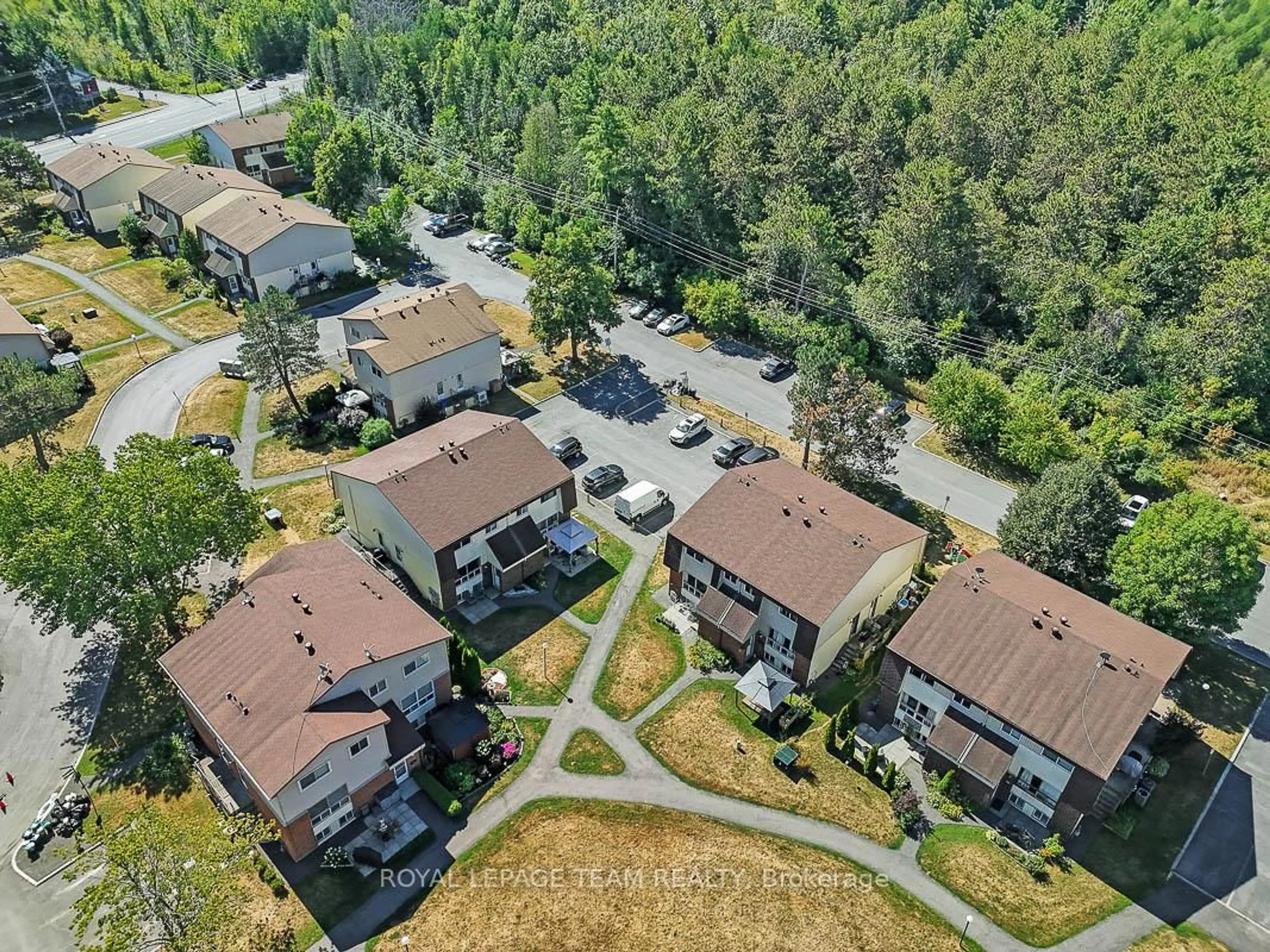 A pic from outside/outdoor area/front of a property/back of a property/a pic from drone, unknown for 9 Forester Cres #C, Ottawa Ontario K2H 8Y1