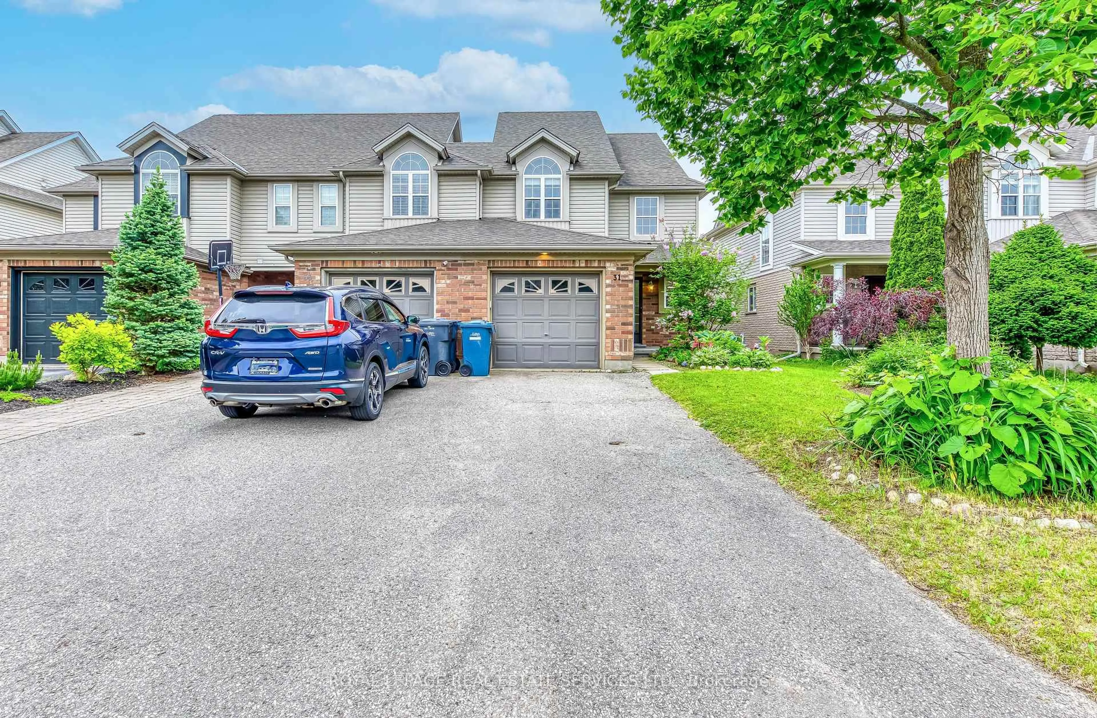 A pic from outside/outdoor area/front of a property/back of a property/a pic from drone, street for 31 EUGENE Dr, Guelph Ontario N1L 1P6