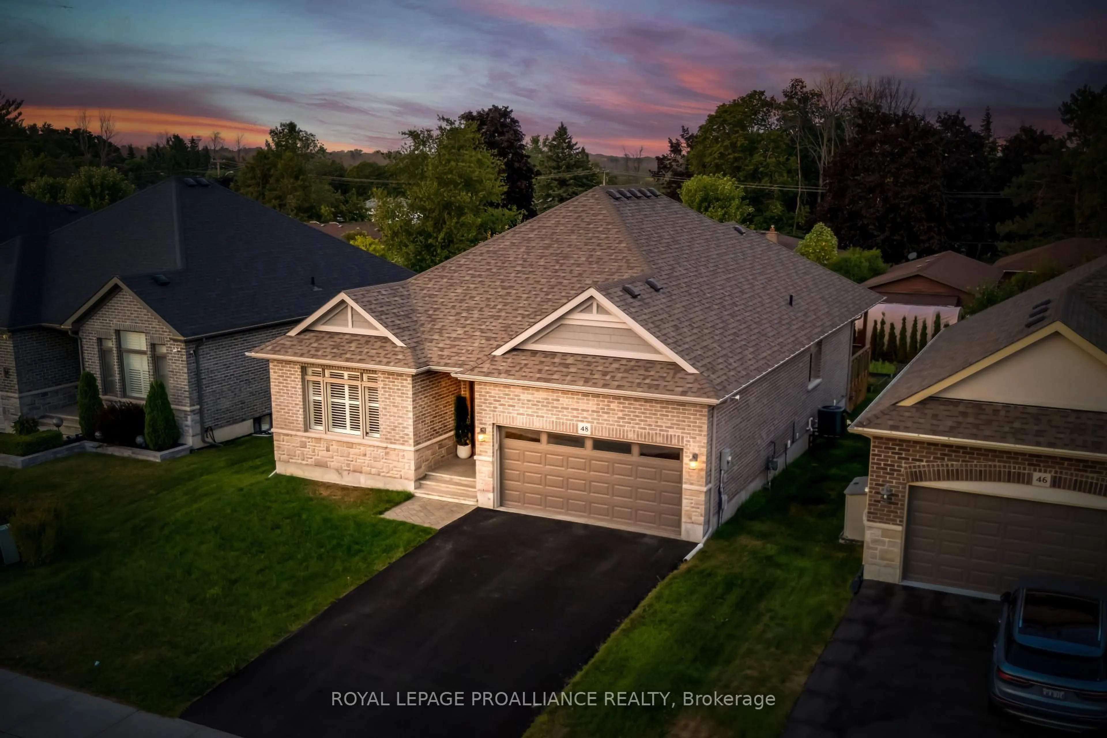A pic from outside/outdoor area/front of a property/back of a property/a pic from drone, street for 48 Stonecrest Blvd, Quinte West Ontario K8R 0A4