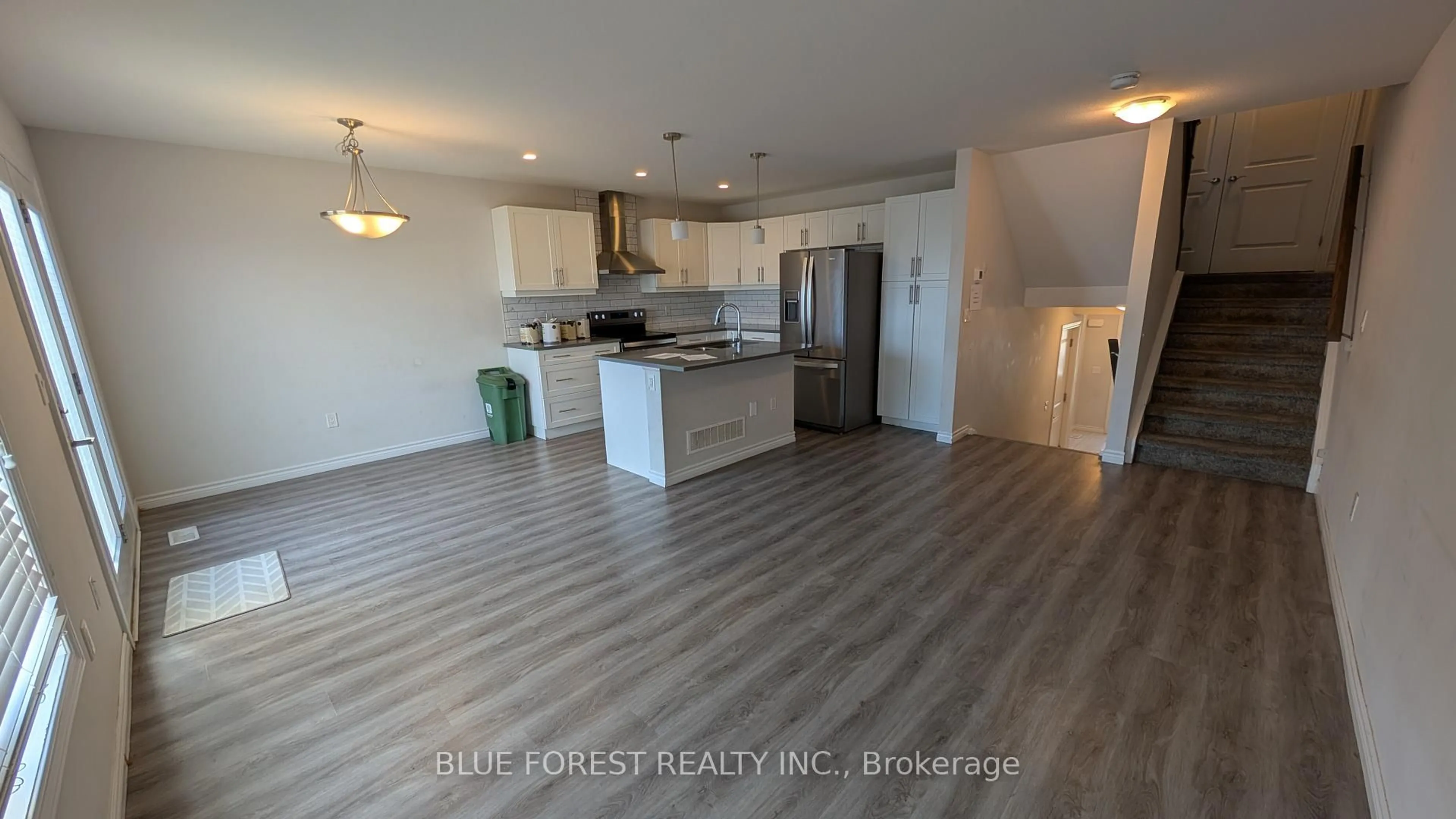 Open concept kitchen, wood/laminate floor for 3400 Castle Rock Pl #34, London South Ontario N6L 0E4