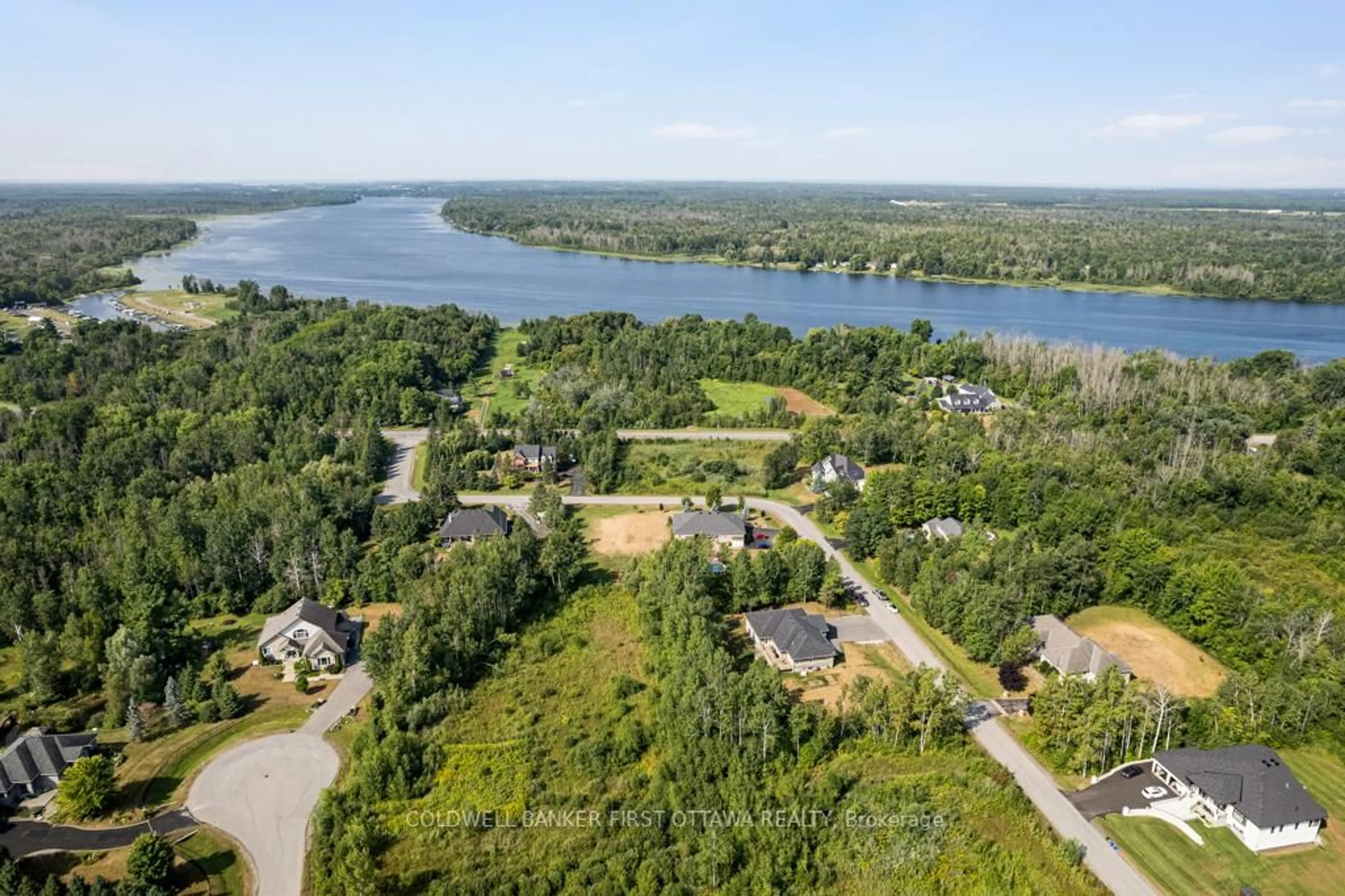 A pic from outside/outdoor area/front of a property/back of a property/a pic from drone, water/lake/river/ocean view for 22 Rideau Crossing Cres, North Grenville Ontario K0G 1J0