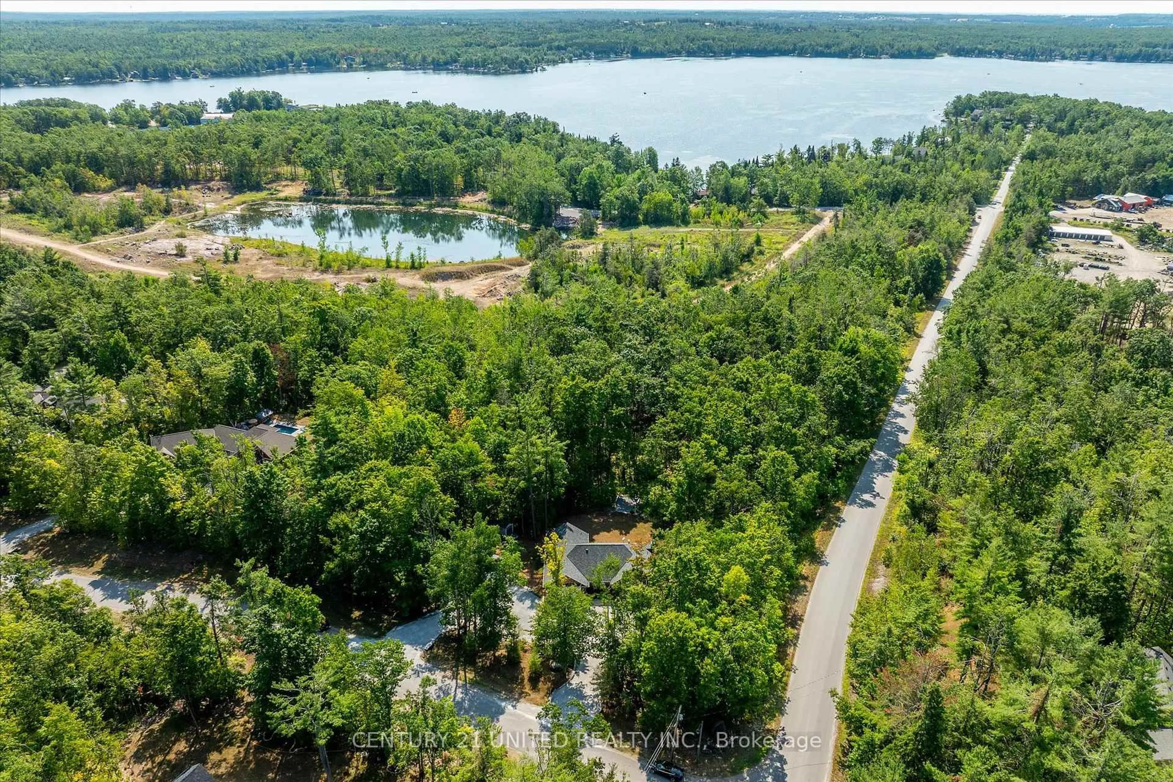 A pic from outside/outdoor area/front of a property/back of a property/a pic from drone, water/lake/river/ocean view for 2 Mitchell Cres, Trent Lakes Ontario K0L 1J0