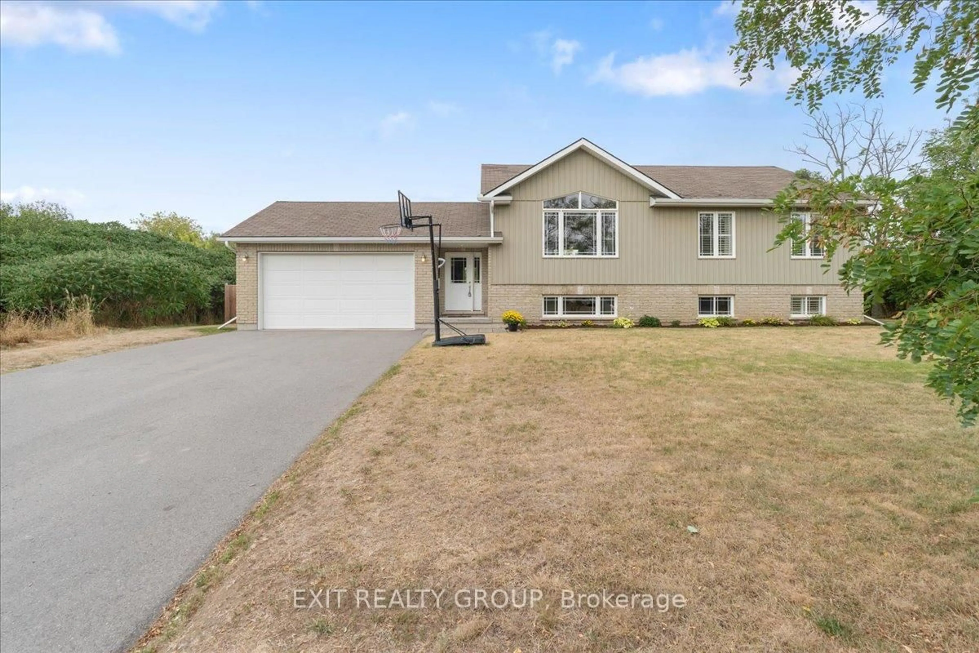 Home with vinyl exterior material, street for 506 County Road 19, Prince Edward County Ontario K0K 1A0