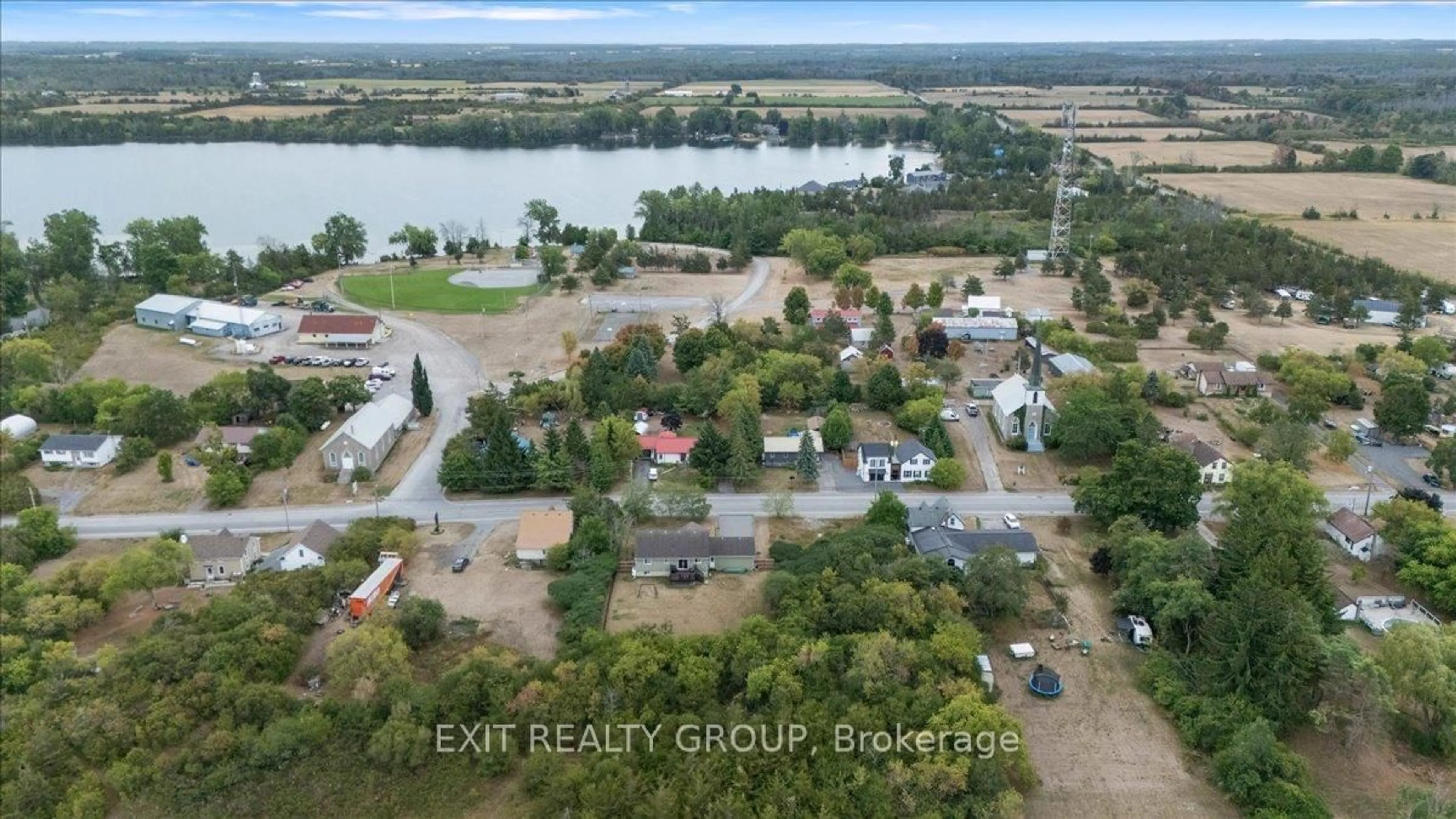 A pic from outside/outdoor area/front of a property/back of a property/a pic from drone, water/lake/river/ocean view for 506 County Road 19, Prince Edward County Ontario K0K 1A0