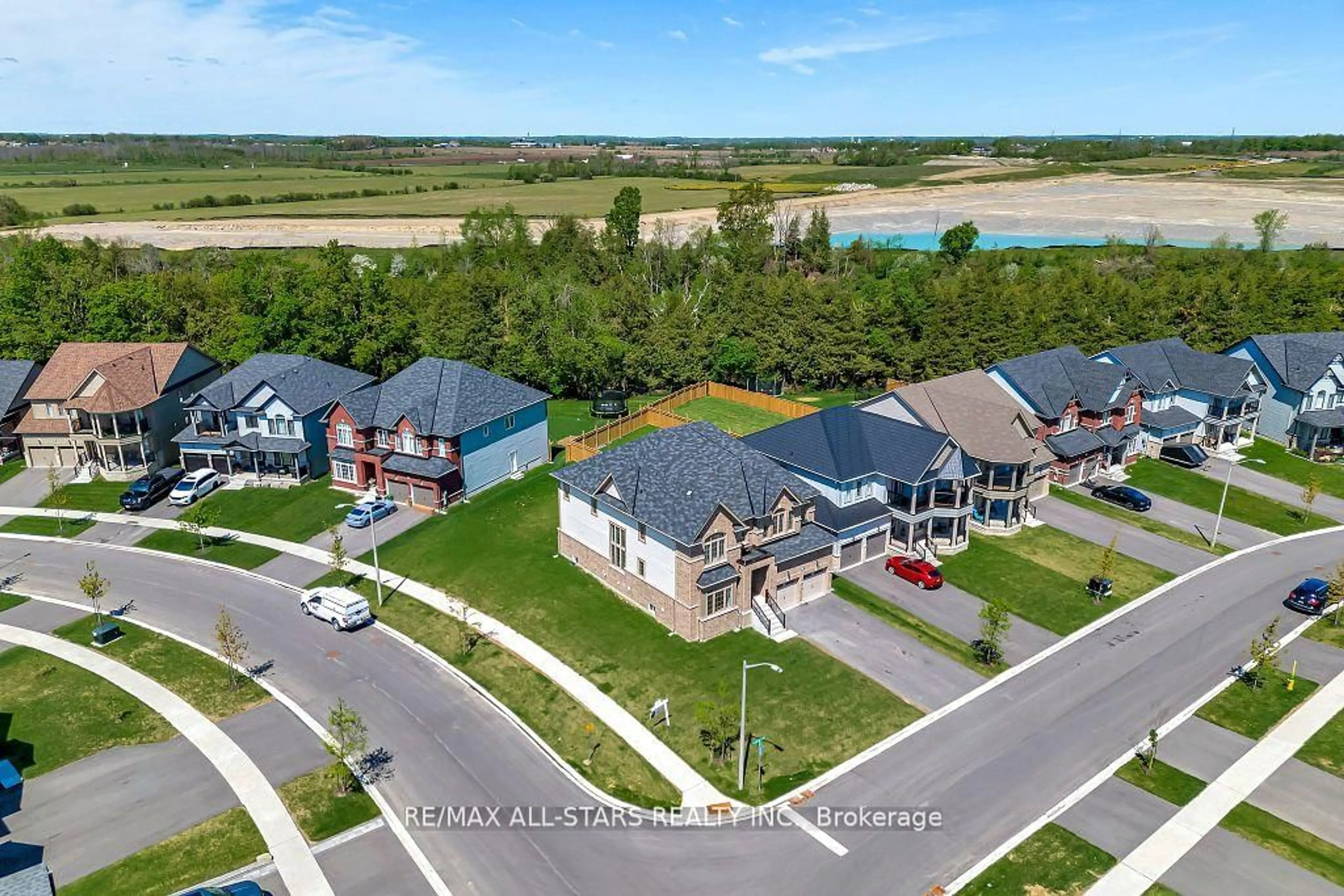 A pic from outside/outdoor area/front of a property/back of a property/a pic from drone, water/lake/river/ocean view for 92 Hennessey Cres, Kawartha Lakes Ontario K9V 1P4