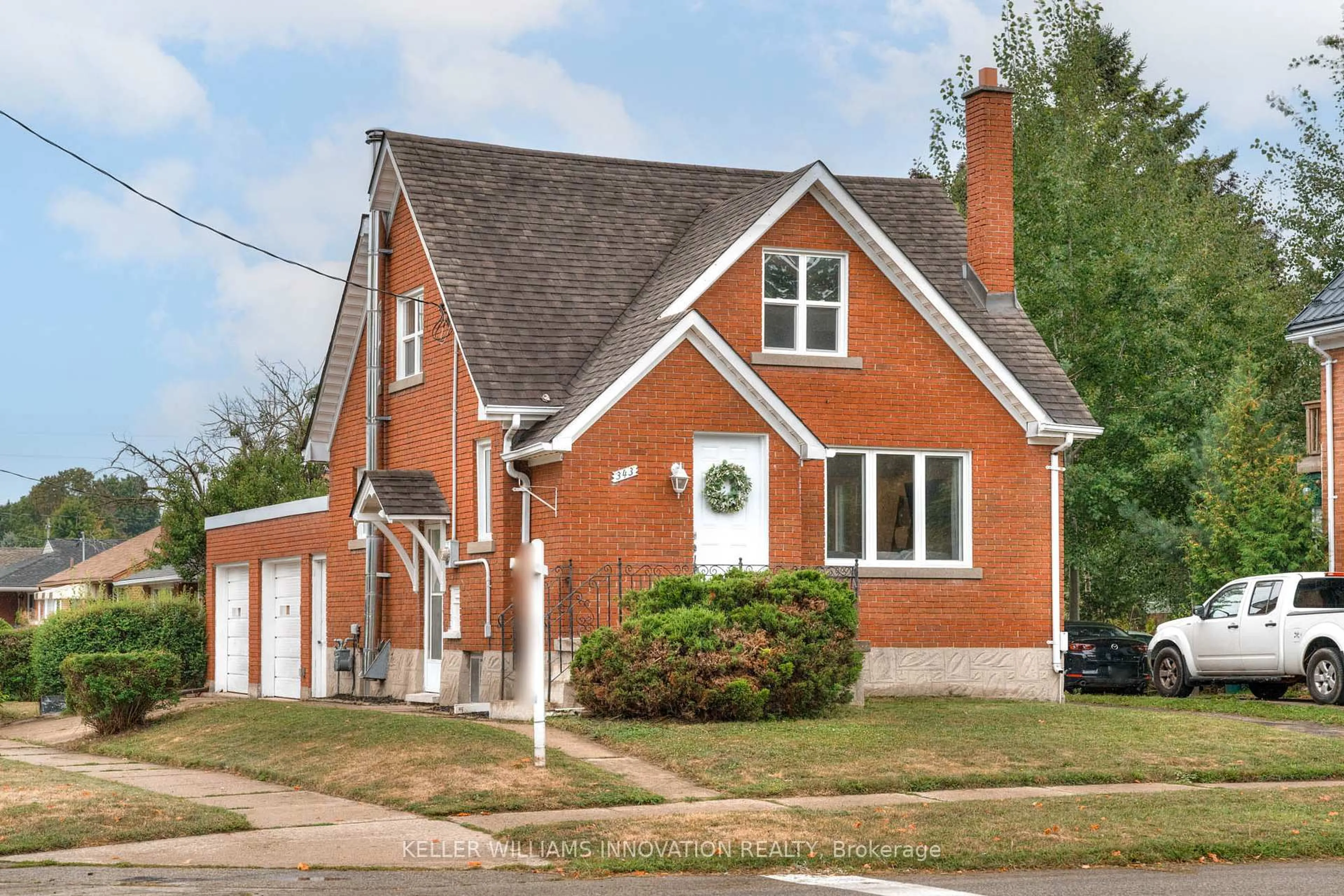 Home with brick exterior material, street for 343 Greenfield Ave, Kitchener Ontario N2C 1E2