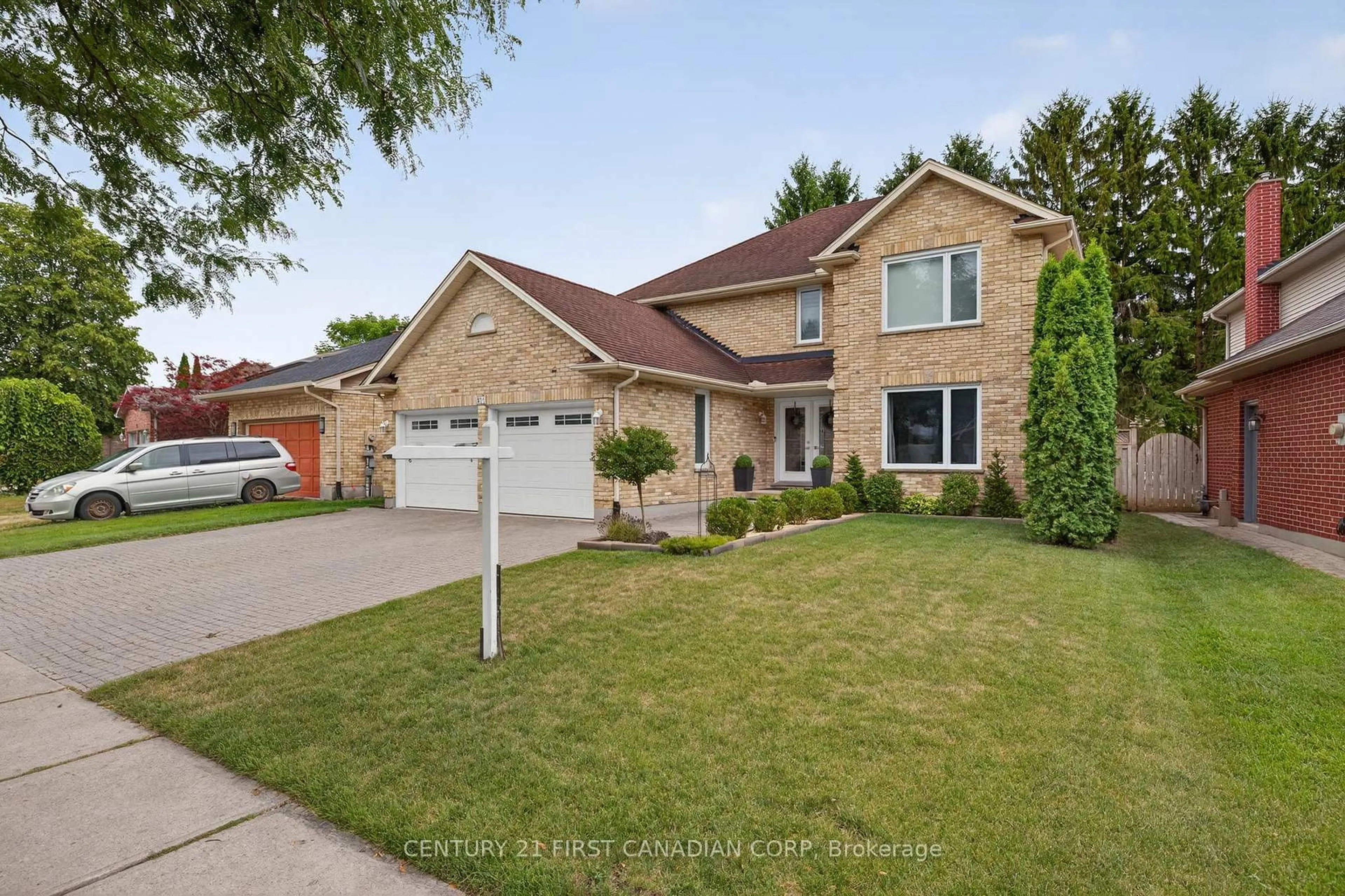 Home with brick exterior material, street for 311 Ambleside Dr, London North Ontario N6G 4V8