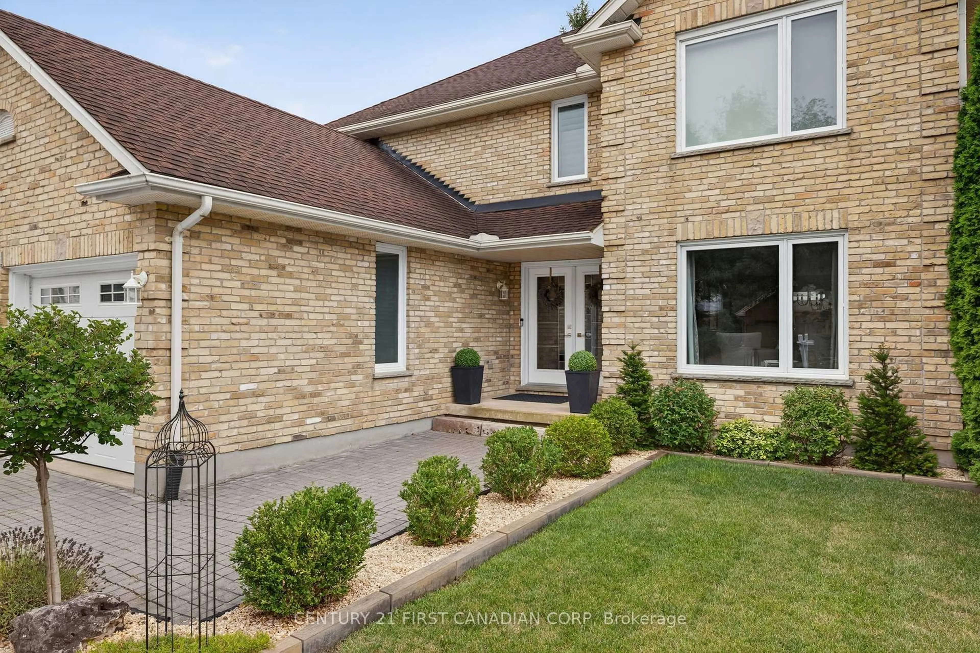 Home with brick exterior material, street for 311 Ambleside Dr, London North Ontario N6G 4V8