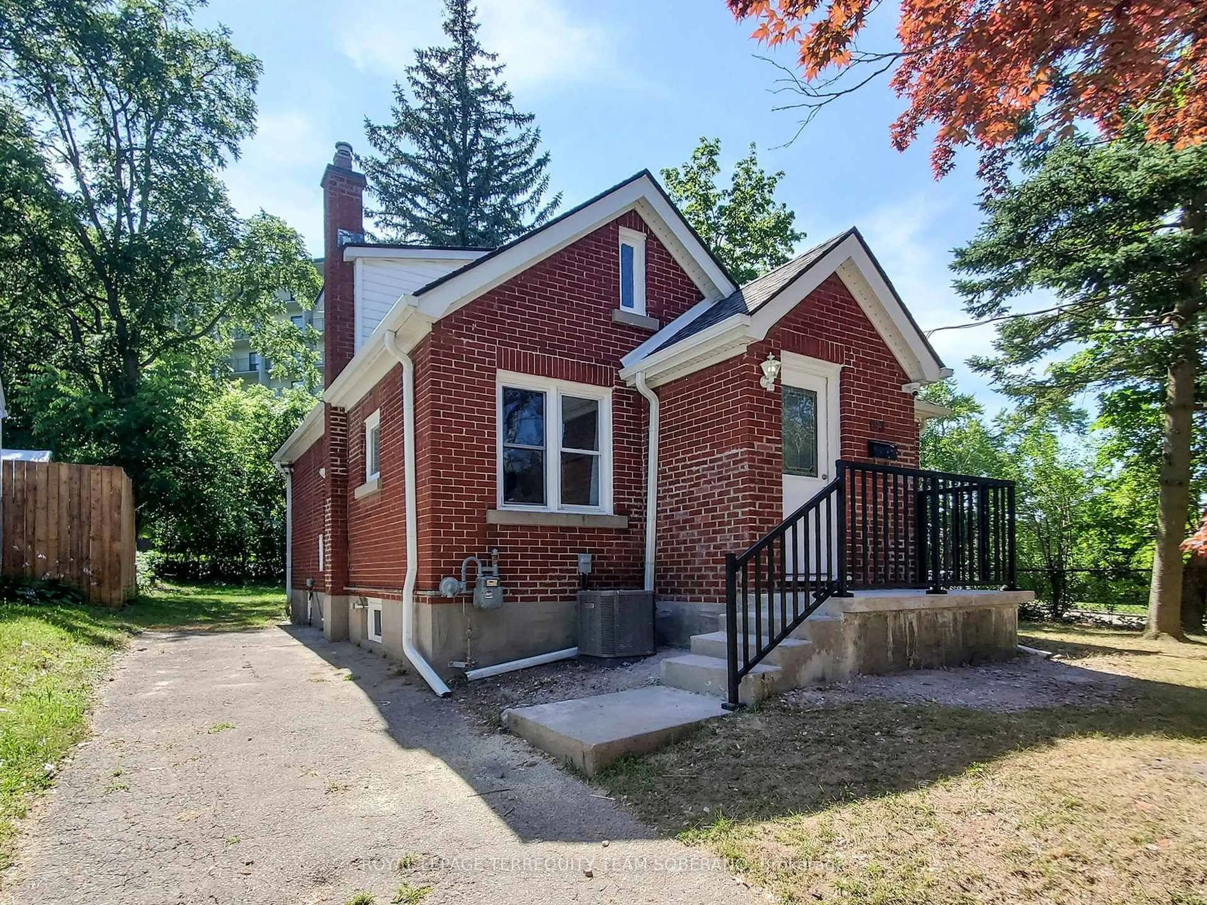 Home with brick exterior material, street for 13 Roslin Ave, Waterloo Ontario N2L 2G4