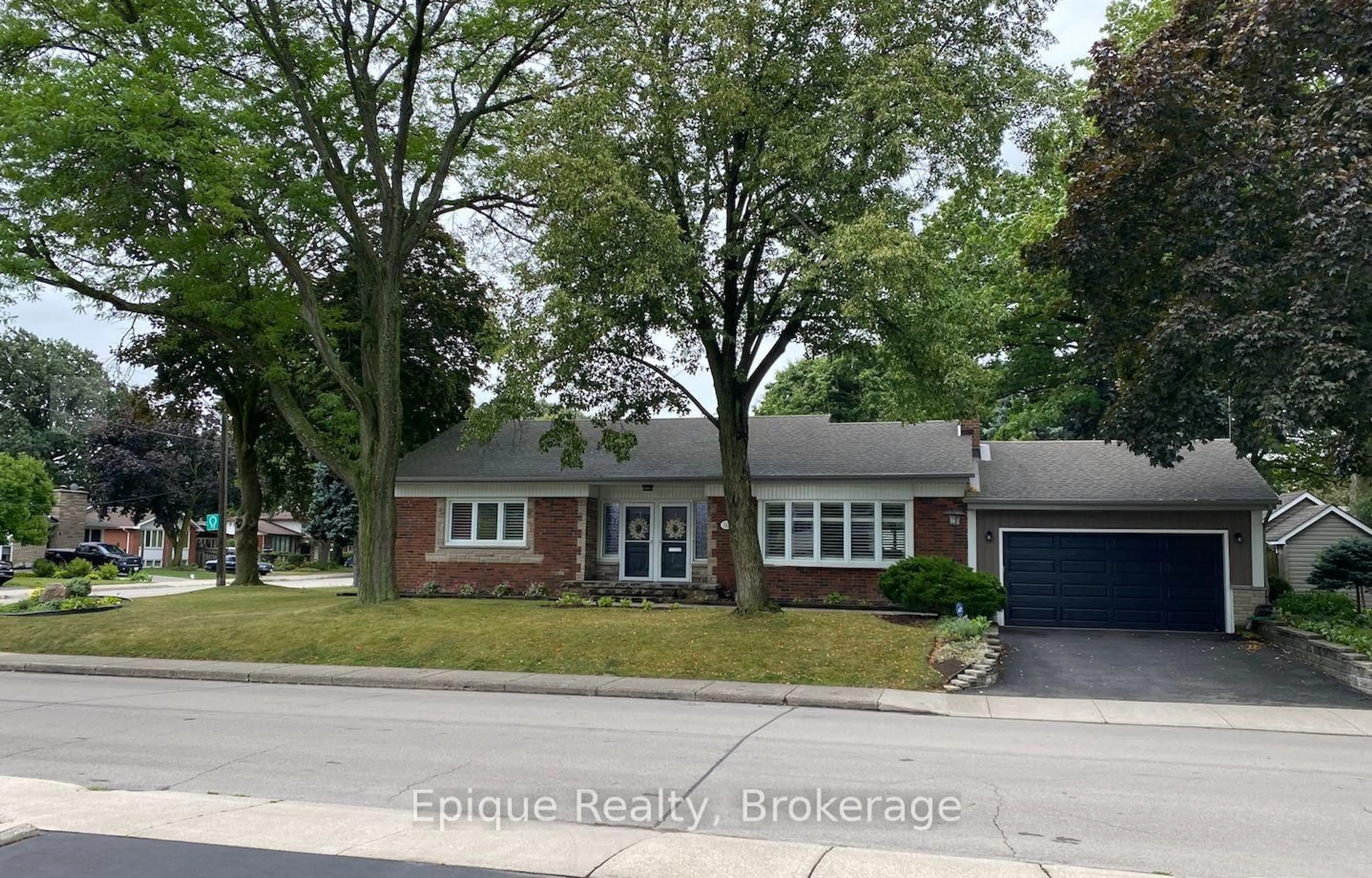 Home with brick exterior material, street for 50 Edgewood Ave, Hamilton Ontario L8T 1K1