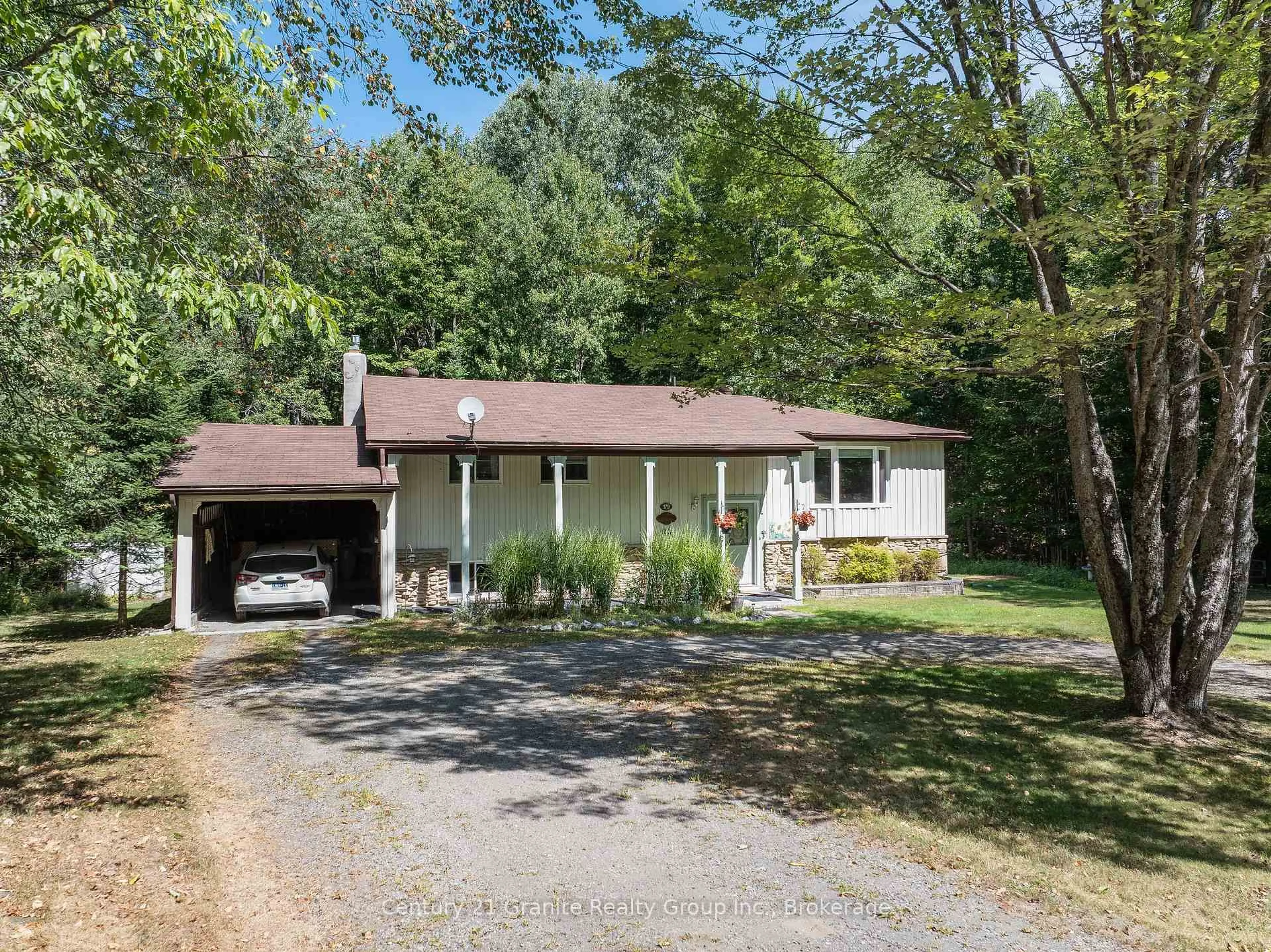 Home with vinyl exterior material, street for 179 Riverside Dr, Dysart et al Ontario K0M 1S0