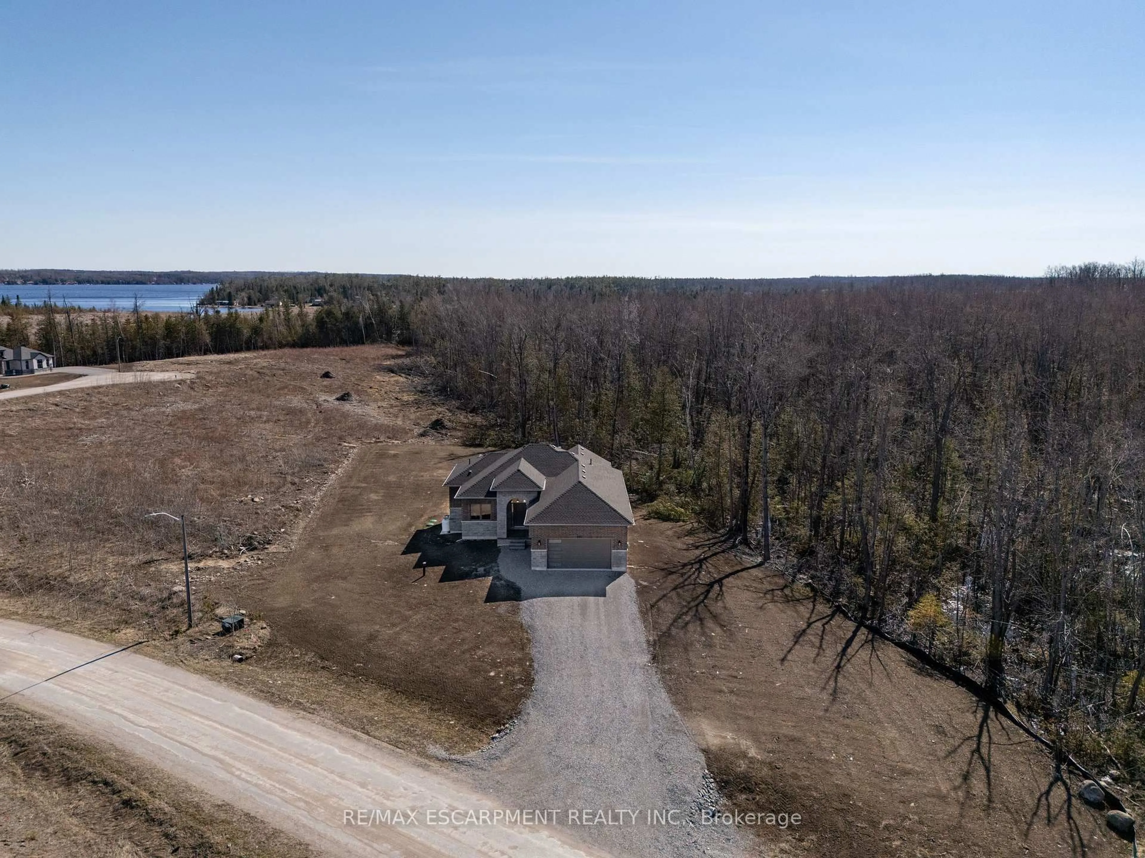 A pic from outside/outdoor area/front of a property/back of a property/a pic from drone, water/lake/river/ocean view for 580 Patterson Rd, Kawartha Lakes Ontario K0M 1N0