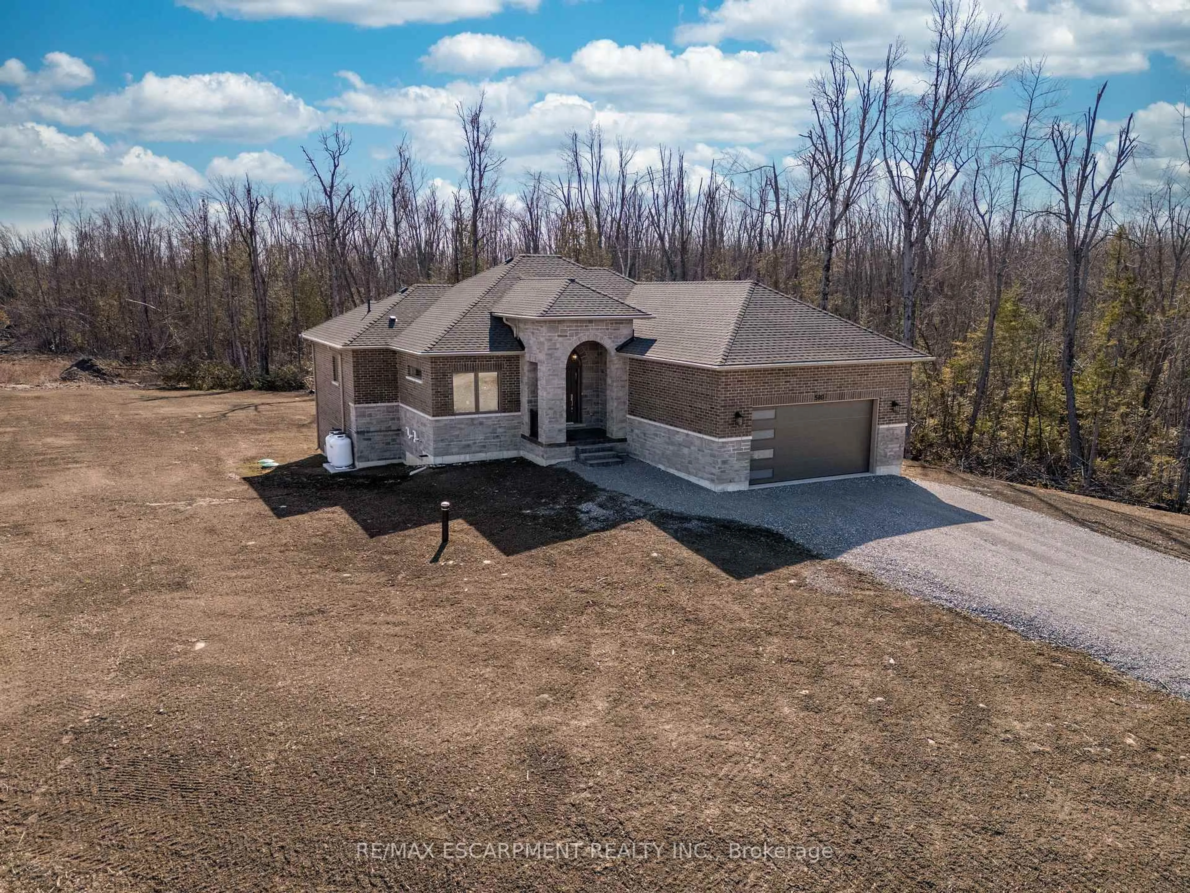 A pic from outside/outdoor area/front of a property/back of a property/a pic from drone, unknown for 580 Patterson Rd, Kawartha Lakes Ontario K0M 1N0