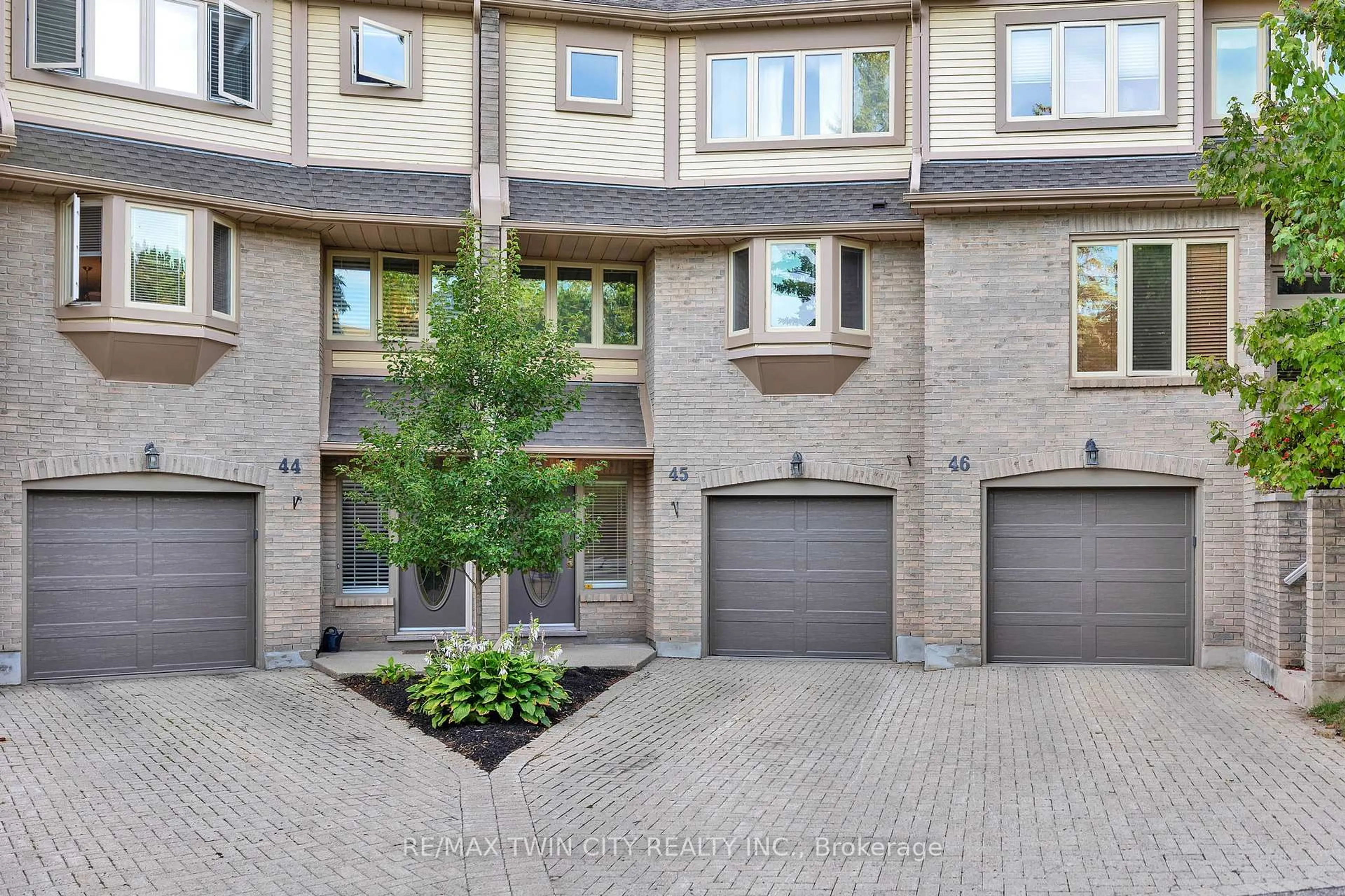 Home with brick exterior material, street for 225 Benjamin Rd #45, Waterloo Ontario N2V 1Z3