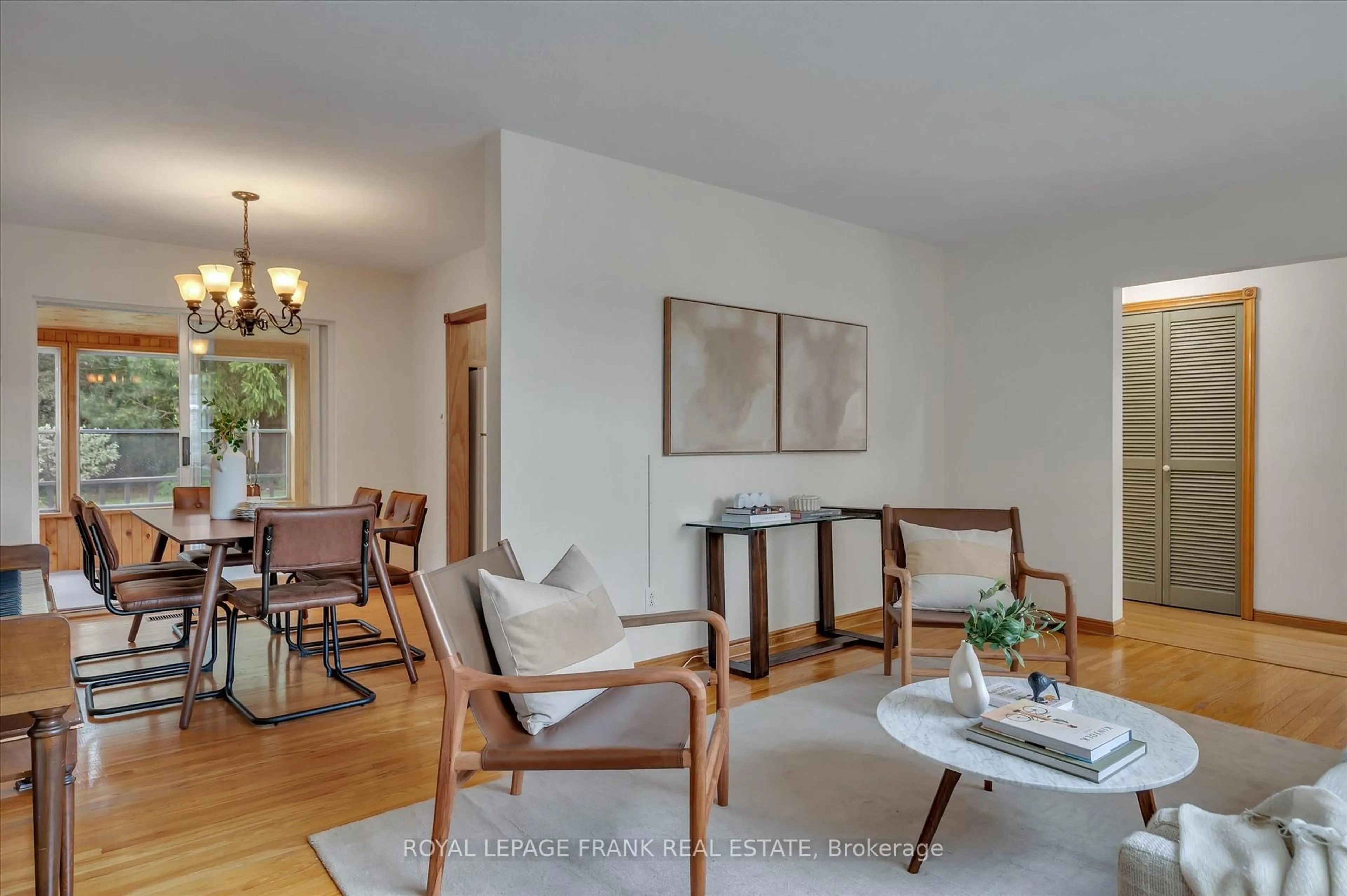 Living room with furniture, wood/laminate floor for 280 Greenlawn Ave, Peterborough North Ontario K9H 5K8