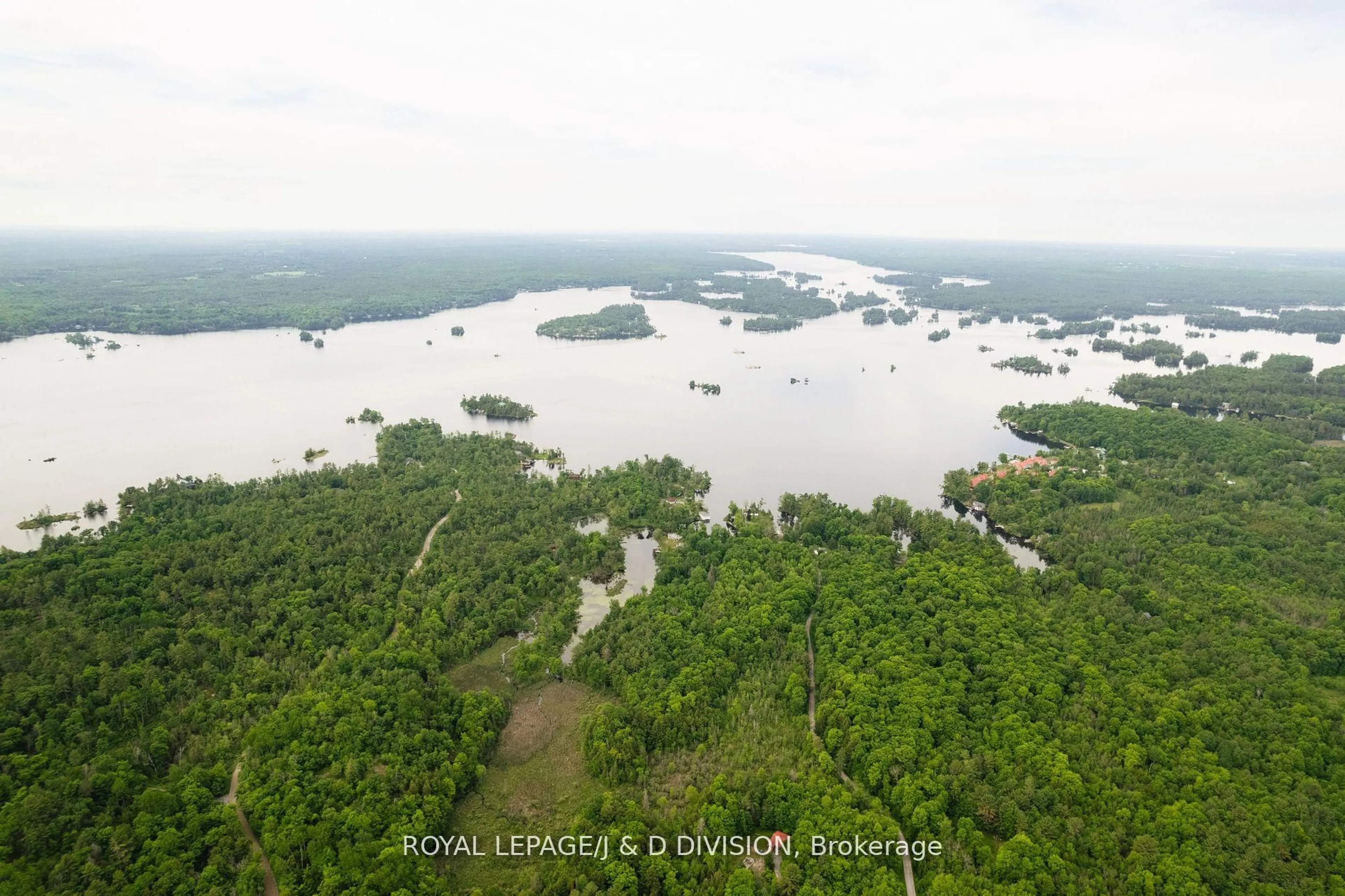 A pic from outside/outdoor area/front of a property/back of a property/a pic from drone, water/lake/river/ocean view for 50 Fire Route 10B, North Kawartha Ontario K0L 3E0
