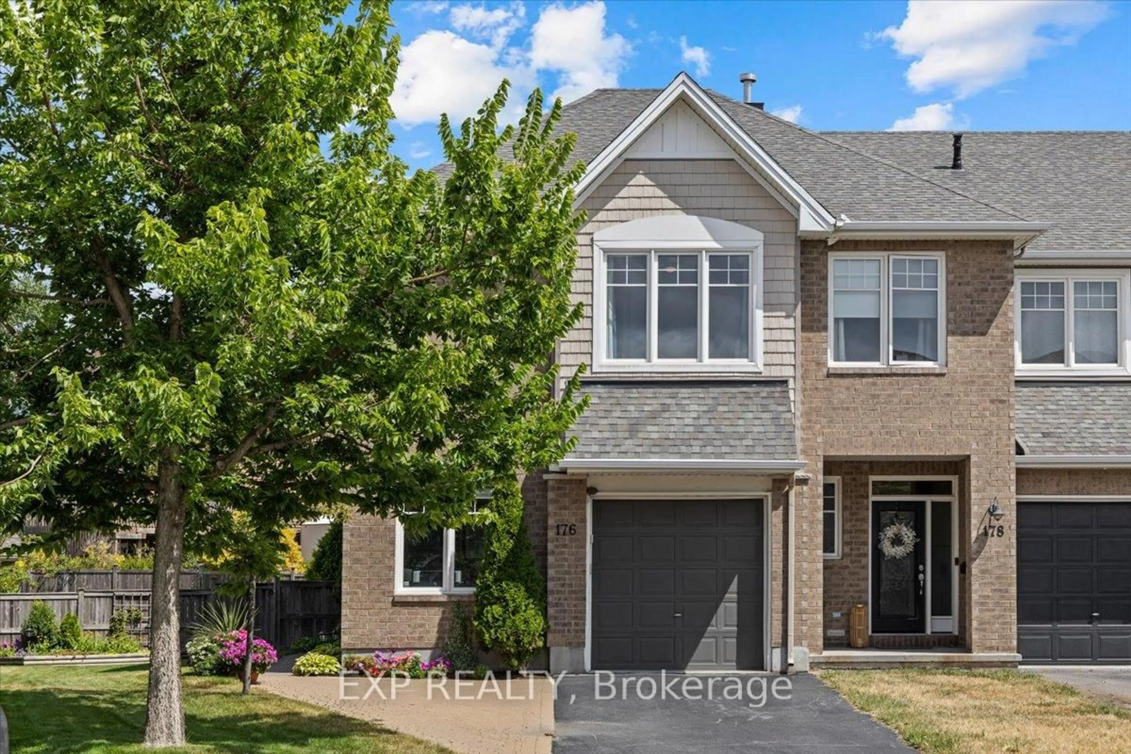 Home with brick exterior material, street for 176 Flat Sedge Cres, Ottawa Ontario K1T 0G9