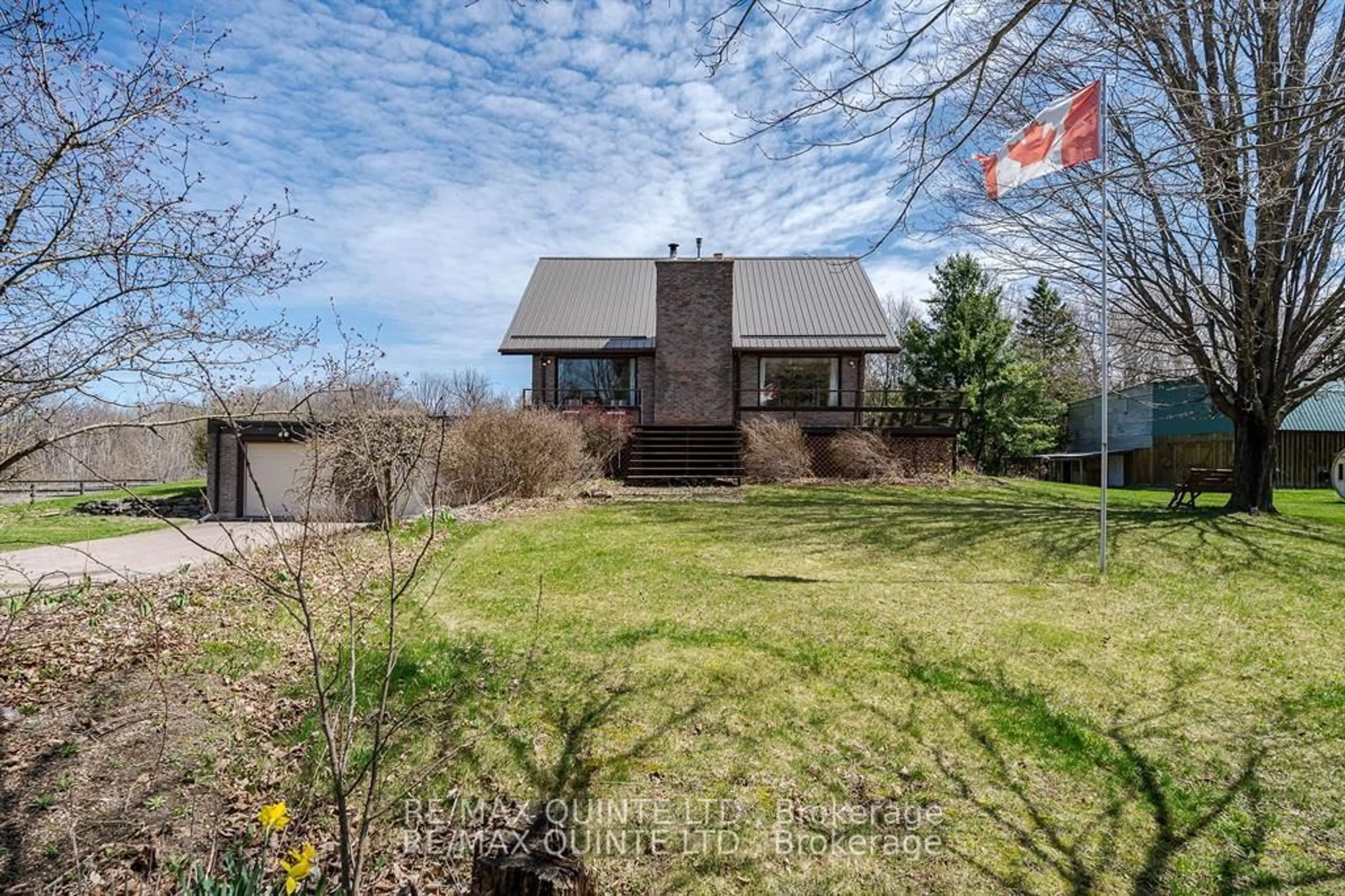 A pic from outside/outdoor area/front of a property/back of a property/a pic from drone, street for 252 Maines Rd, Thomasburg Ontario K0K 3H0
