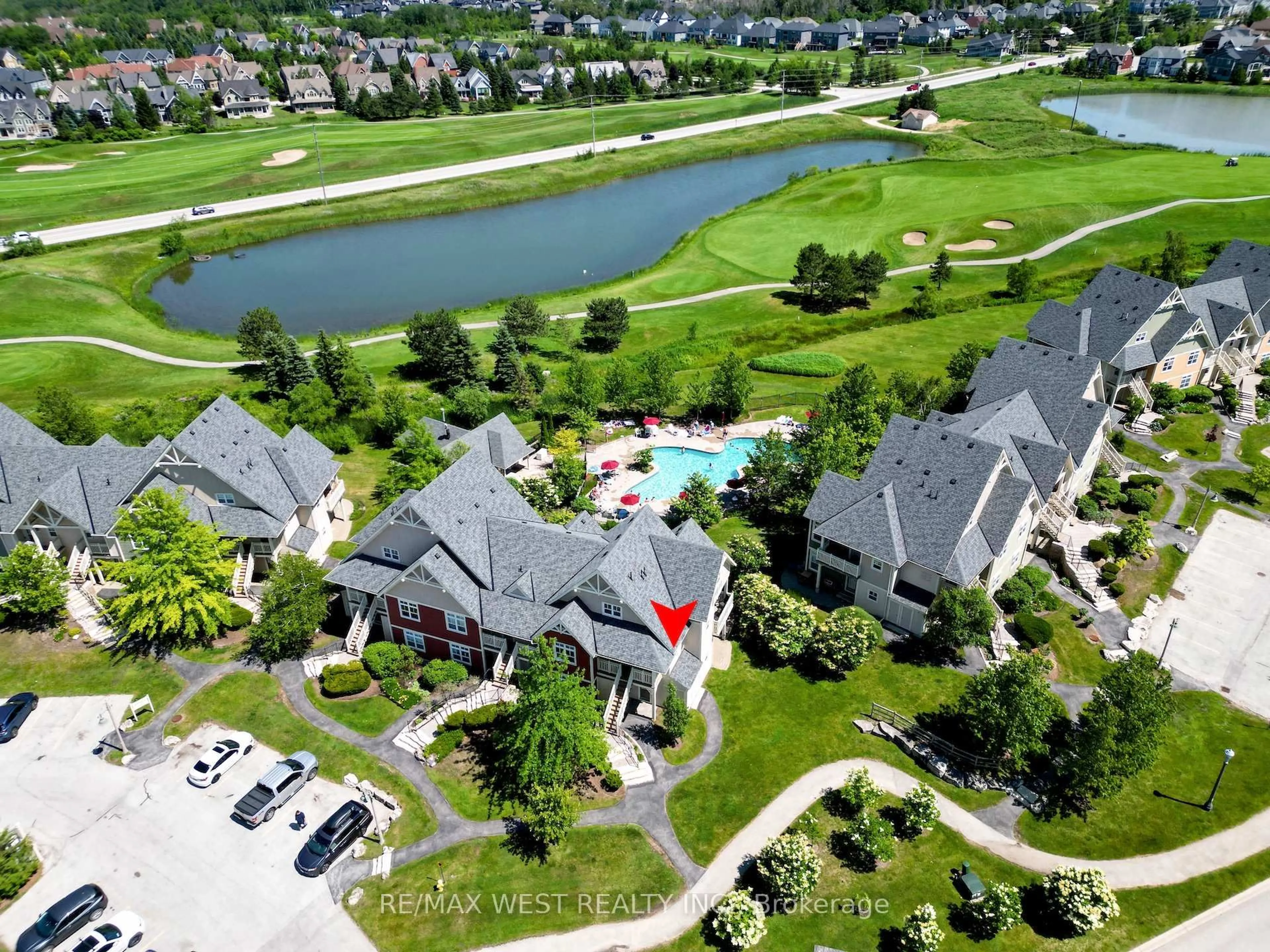 A pic from outside/outdoor area/front of a property/back of a property/a pic from drone, water/lake/river/ocean view for 125 Fairway Crt #119, Blue Mountains Ontario L9Y 0P8