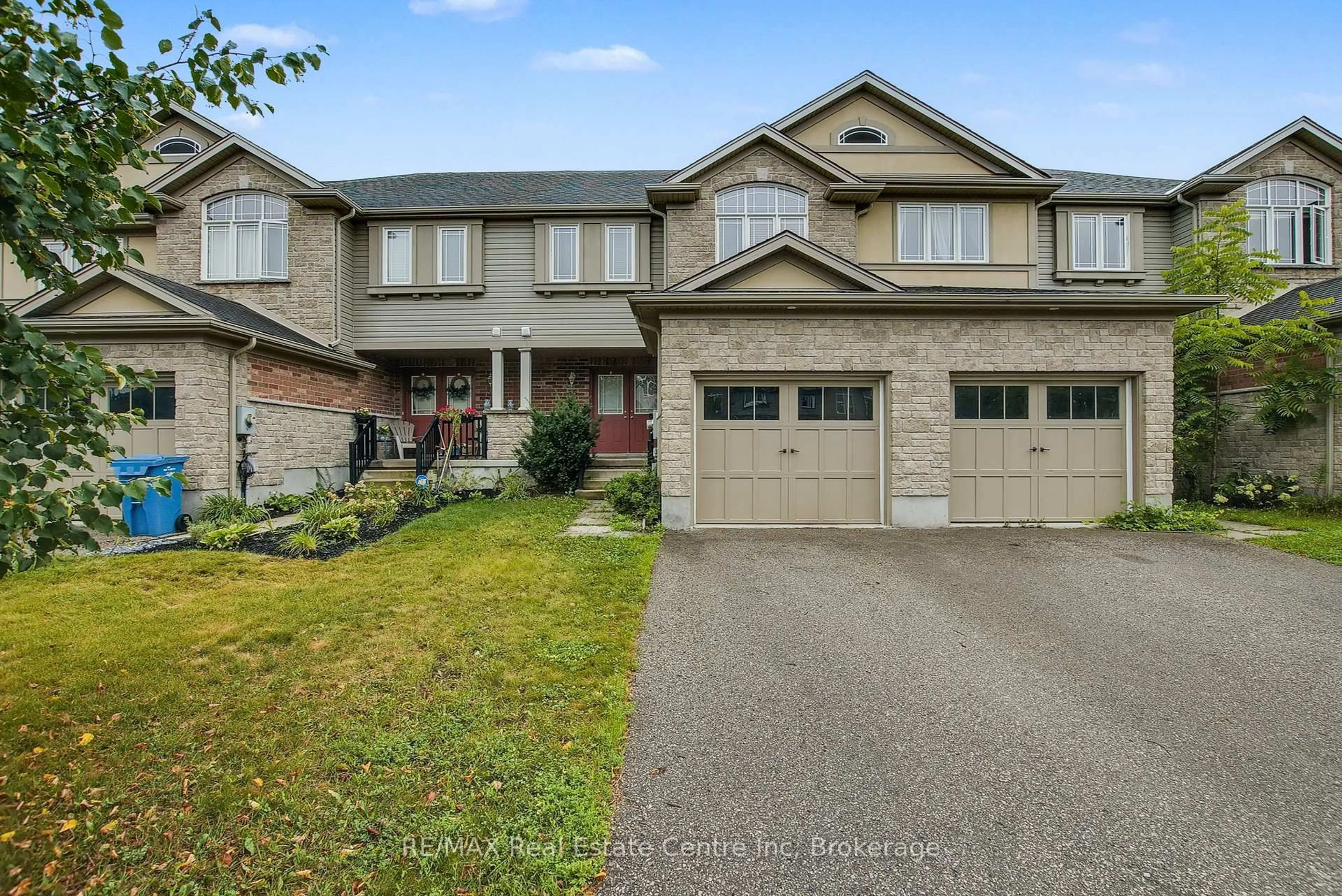 Home with brick exterior material, street for 35 Revell Dr, Guelph Ontario N1G 0B2