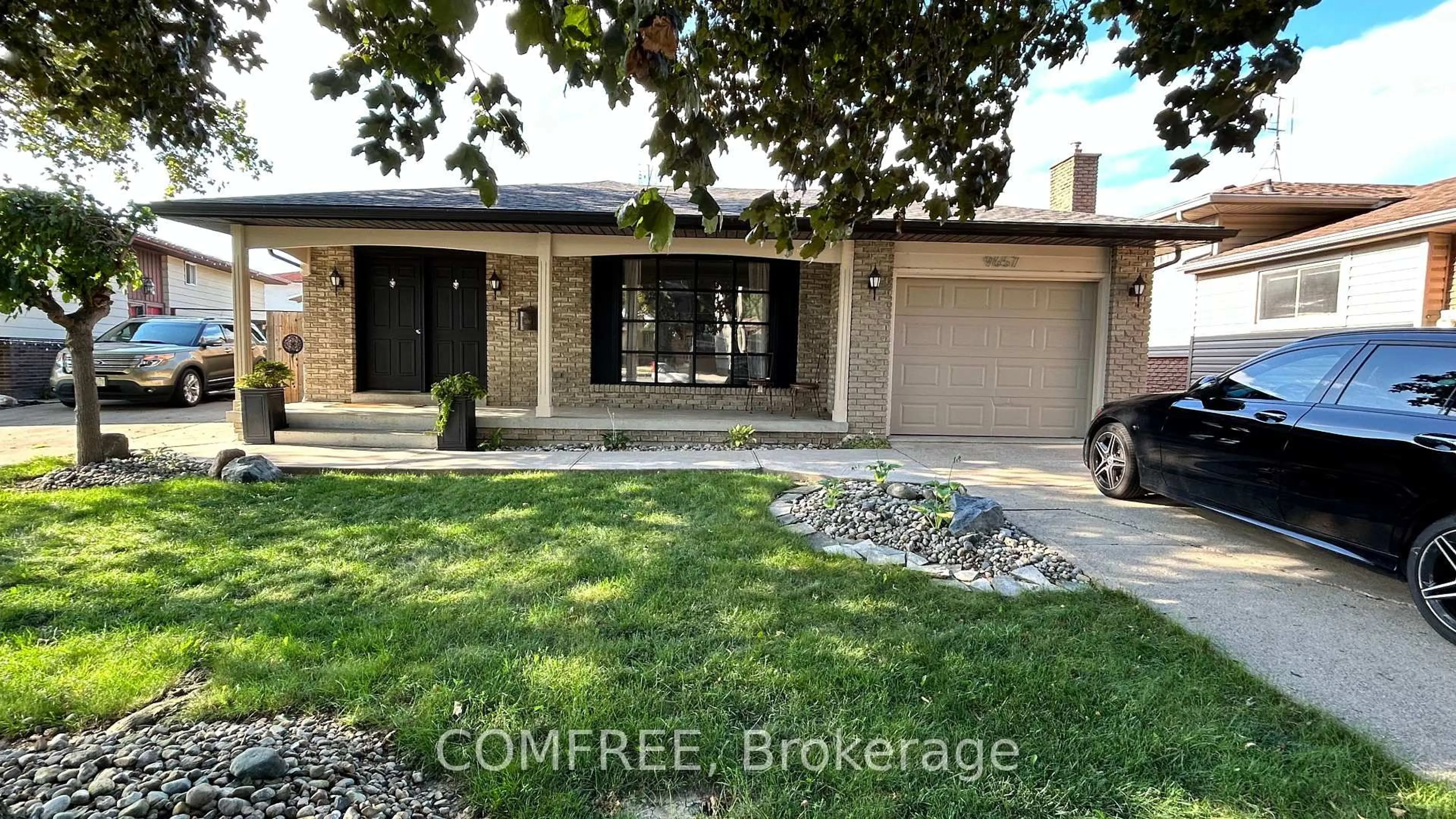 Home with brick exterior material, street for 9657 Midfield Cres, Windsor Ontario N8R 1W9