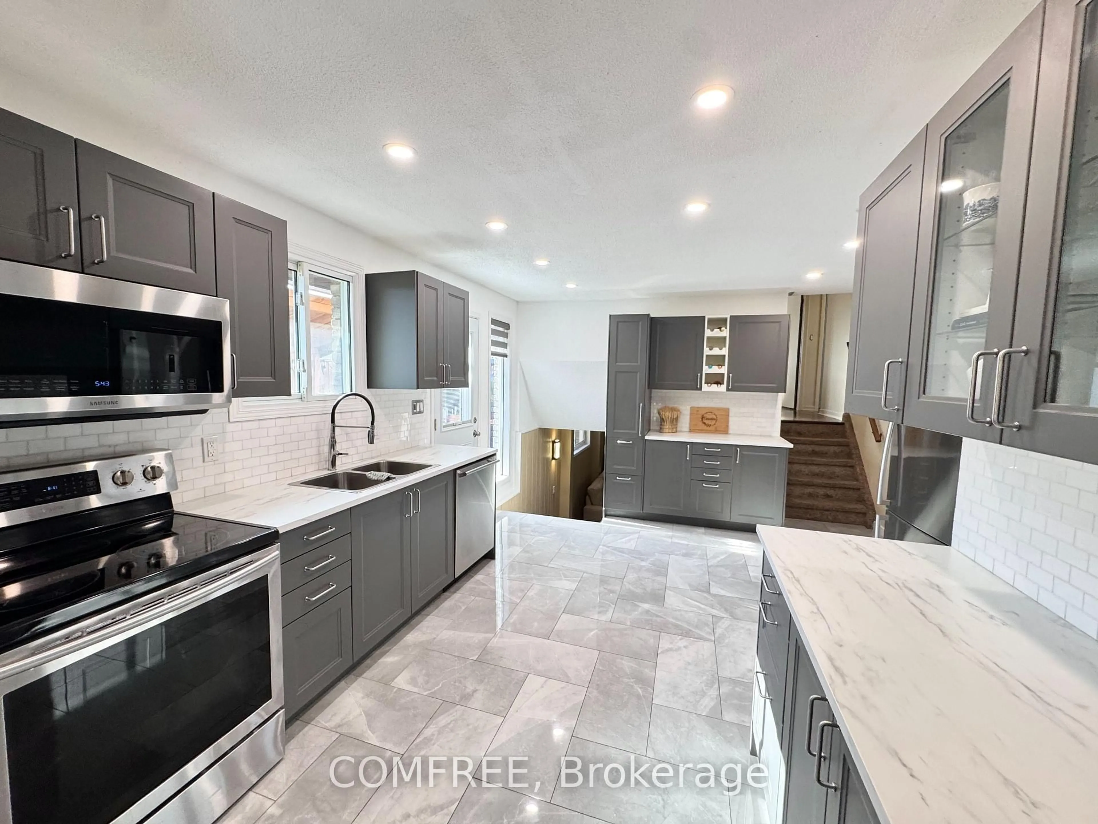 Contemporary kitchen, ceramic/tile floor for 9657 Midfield Cres, Windsor Ontario N8R 1W9