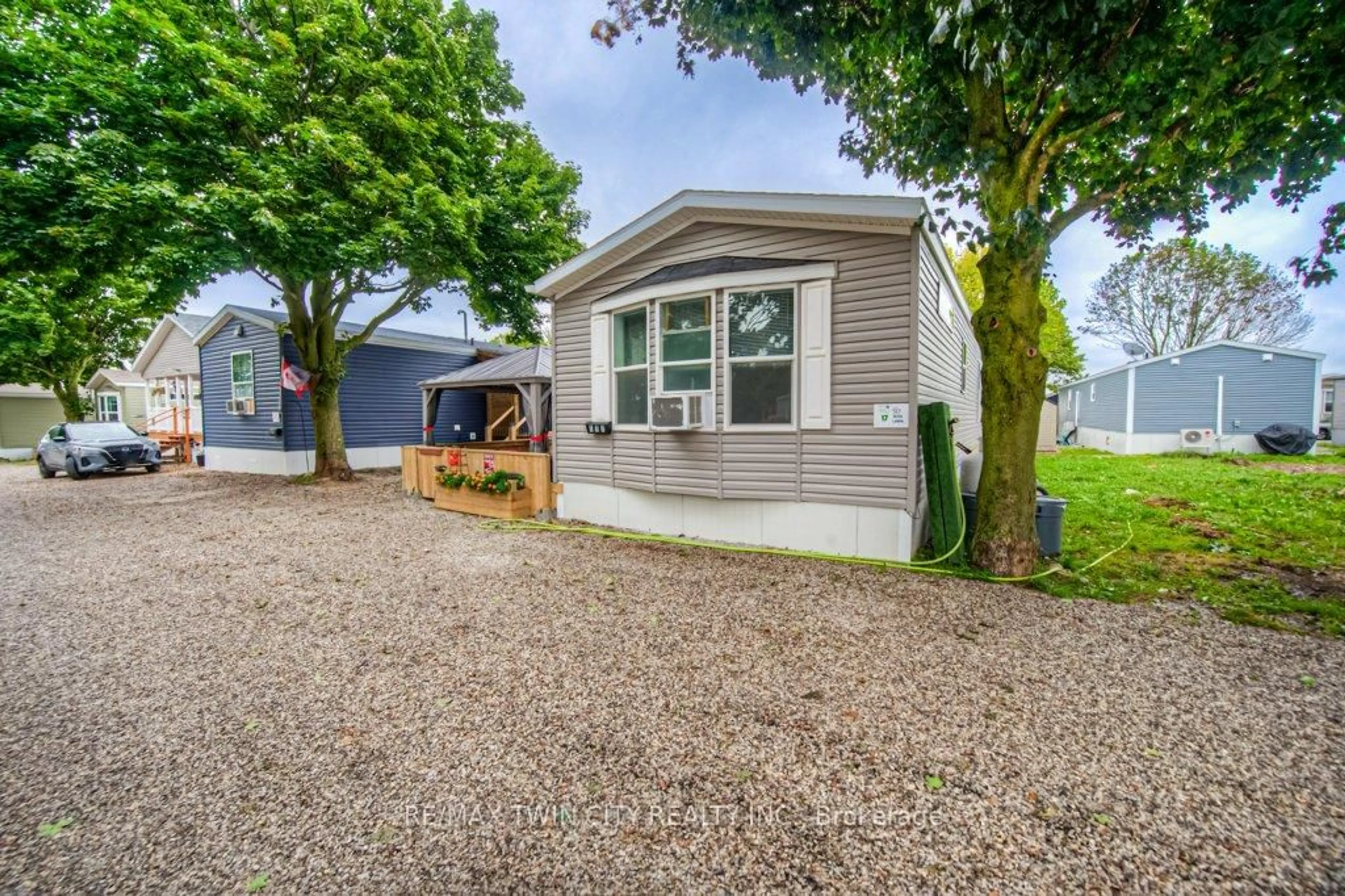 Home with vinyl exterior material, street for 99 Fourth Concession Rd #517, Brant Ontario N0E 1A0