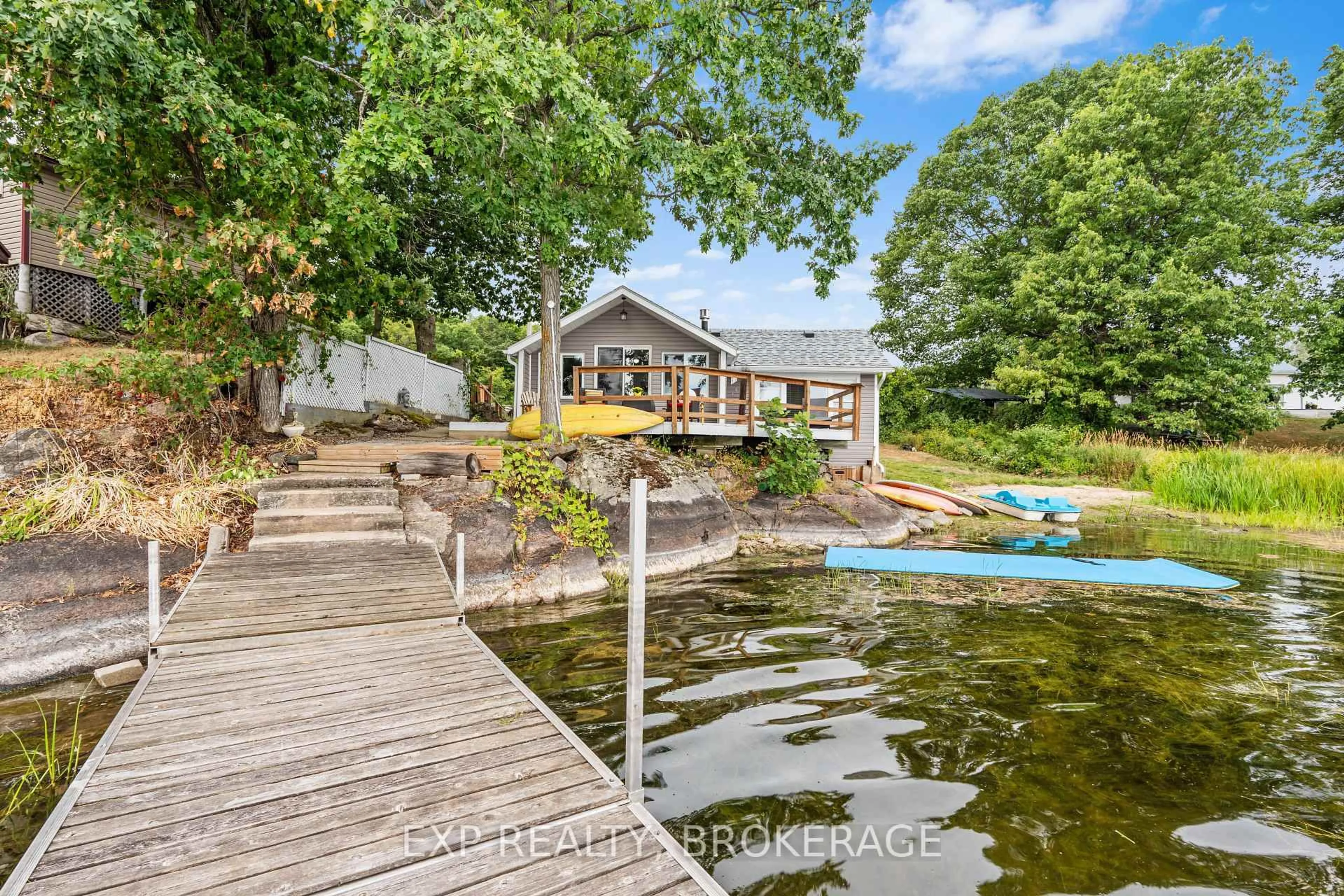 A pic from outside/outdoor area/front of a property/back of a property/a pic from drone, water/lake/river/ocean view for 1035 LLOYD Lane, Verona Ontario K0H 2W0