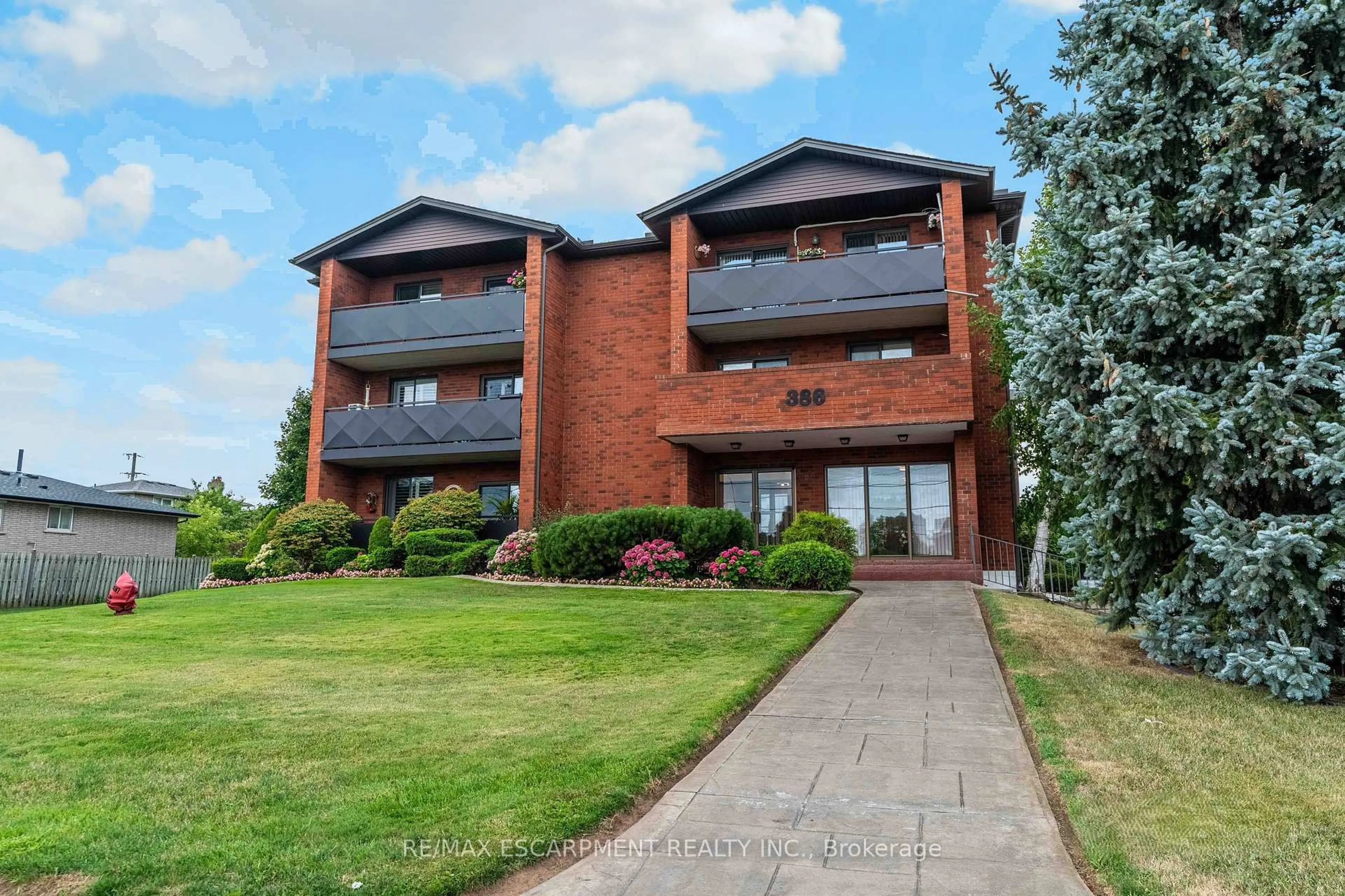 A pic from outside/outdoor area/front of a property/back of a property/a pic from drone, unknown for 386 Highway 8 #205, Hamilton Ontario L8G 1E9