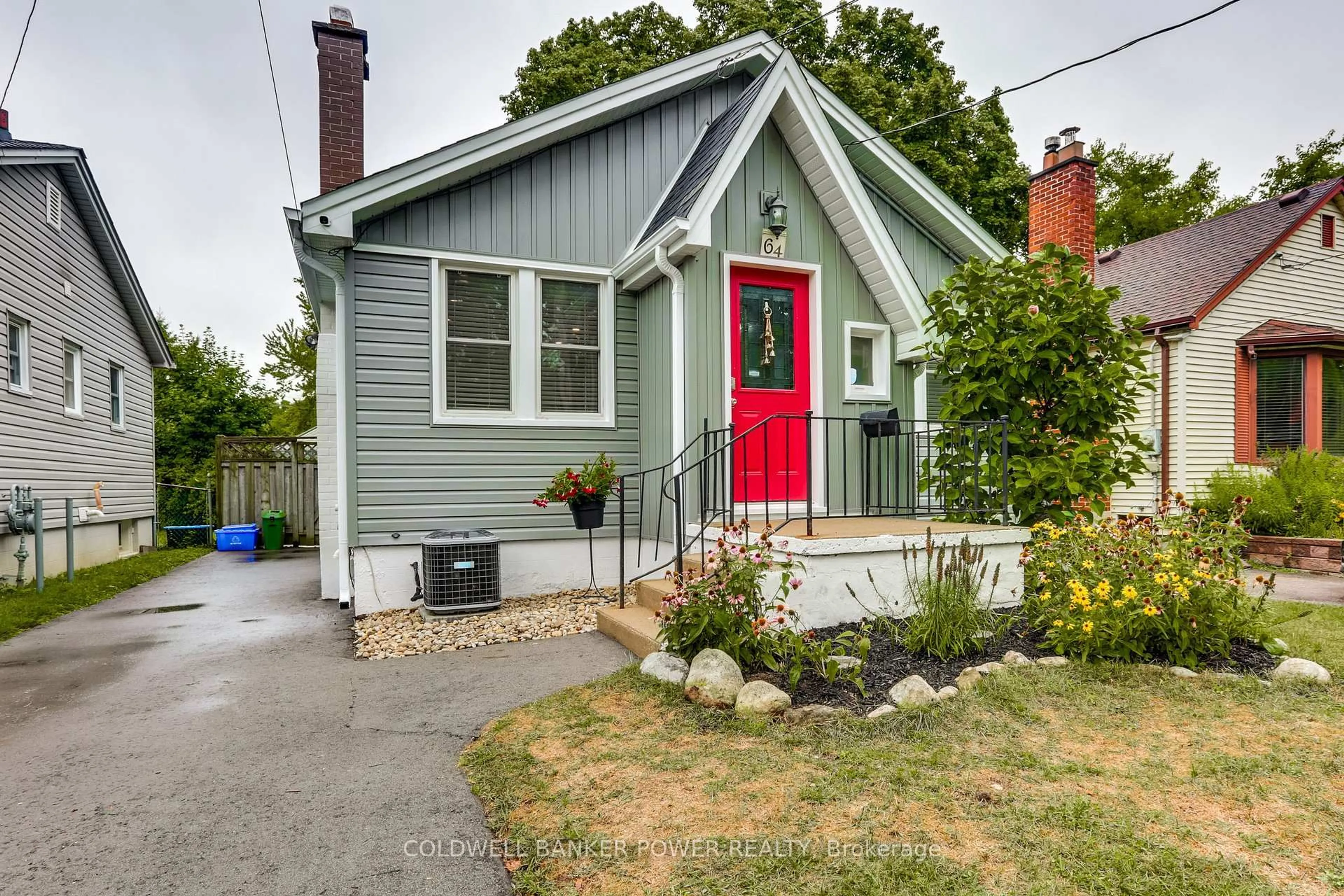 Home with vinyl exterior material, street for 64 Bond St, London South Ontario N6C 1W3