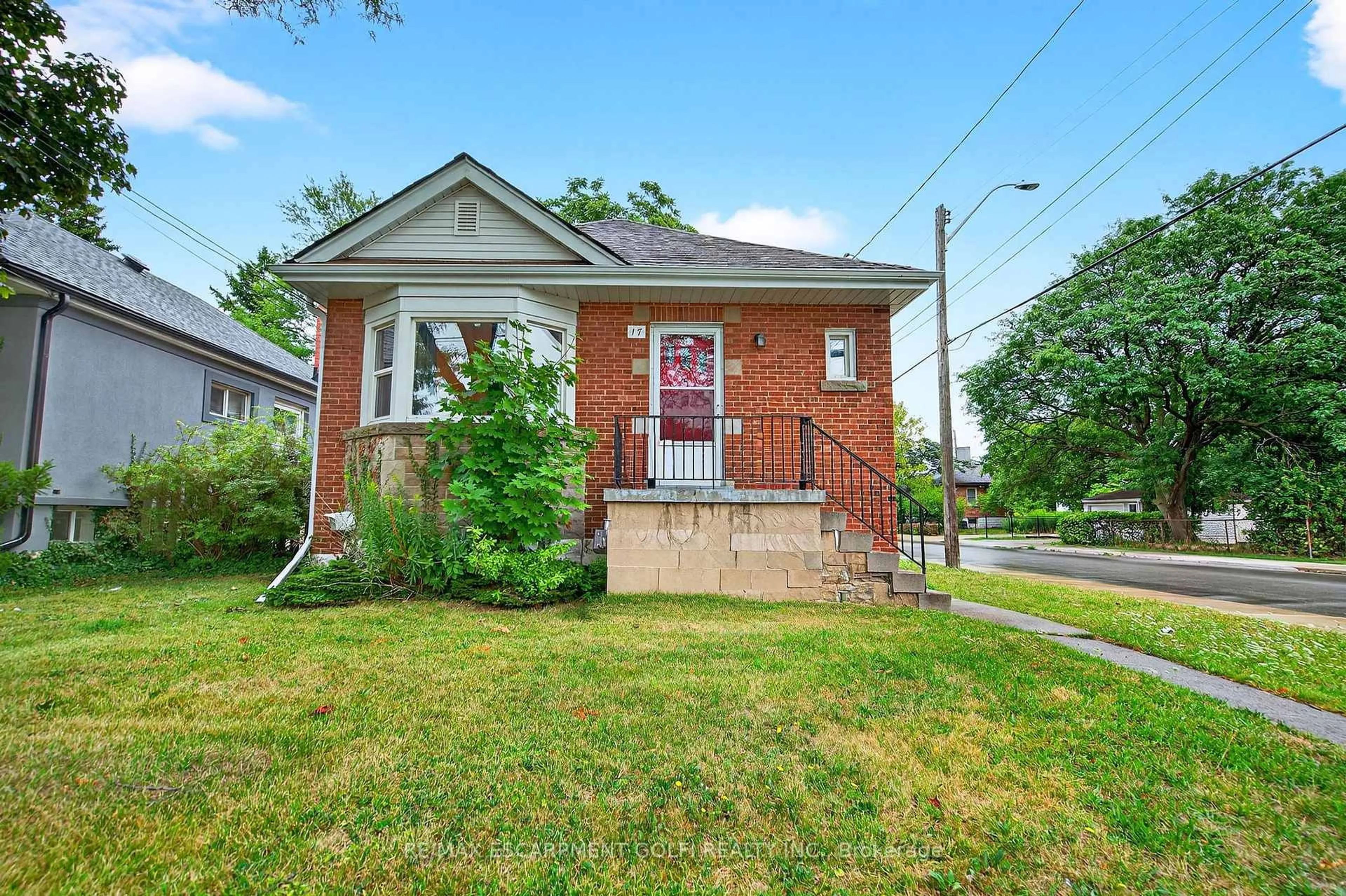 Home with brick exterior material, street for 17 West 3RD St, Hamilton Ontario L9C 3J5