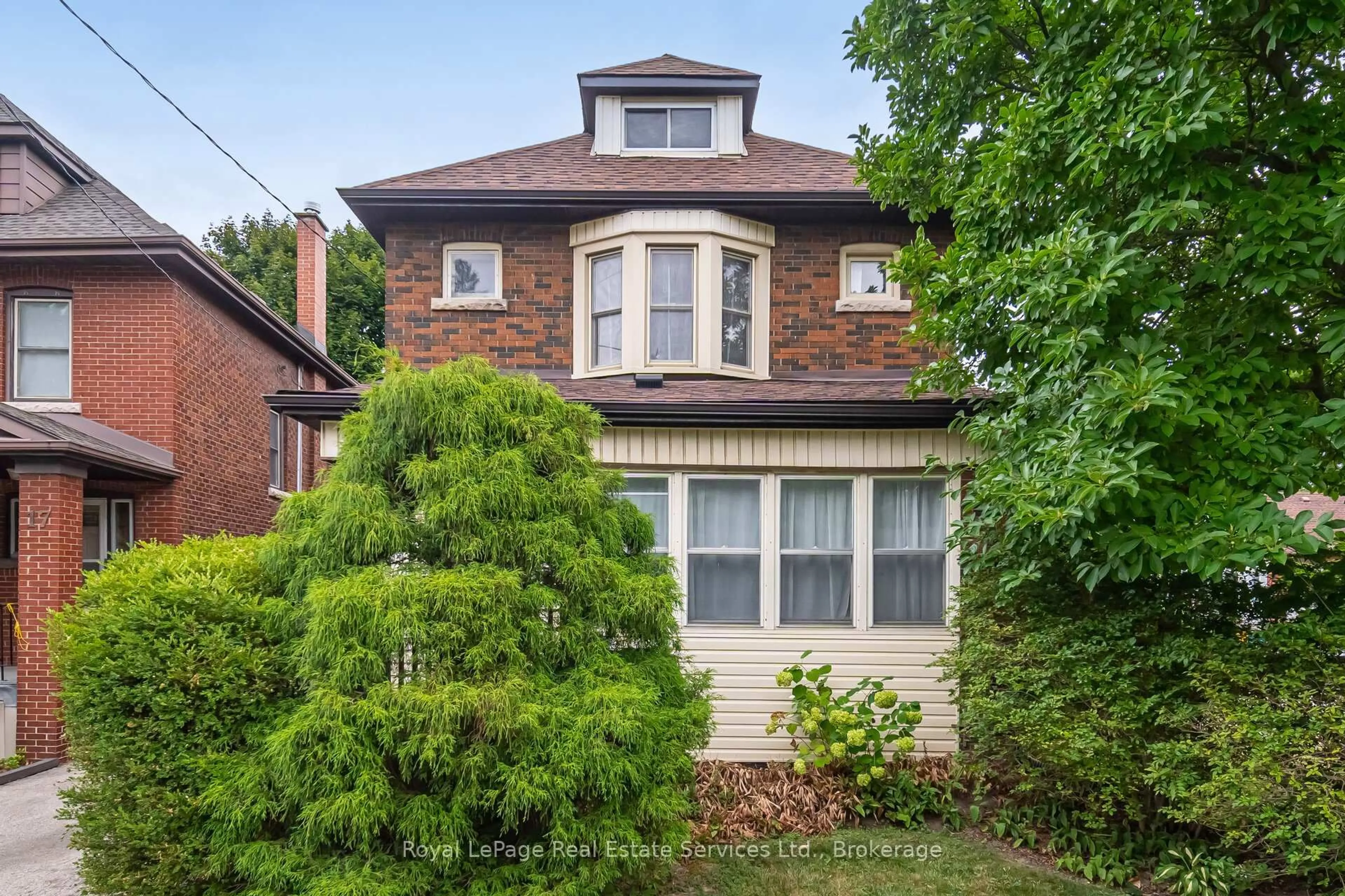 Home with brick exterior material, street for 21 Paisley Ave, Hamilton Ontario L8S 1T8