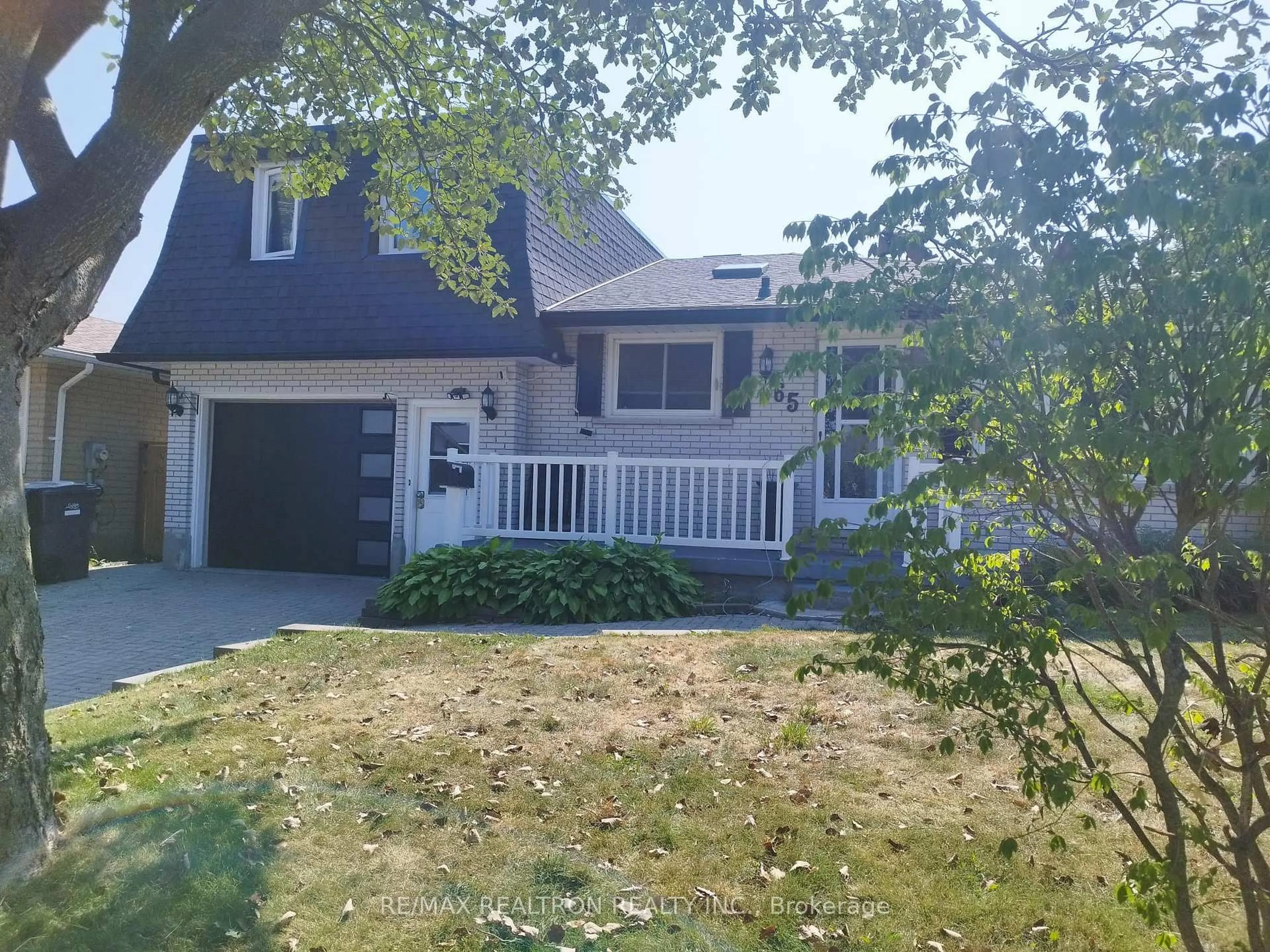 Home with vinyl exterior material, street for 65 Mcilwraith Cres, Guelph Ontario N1E 6J4