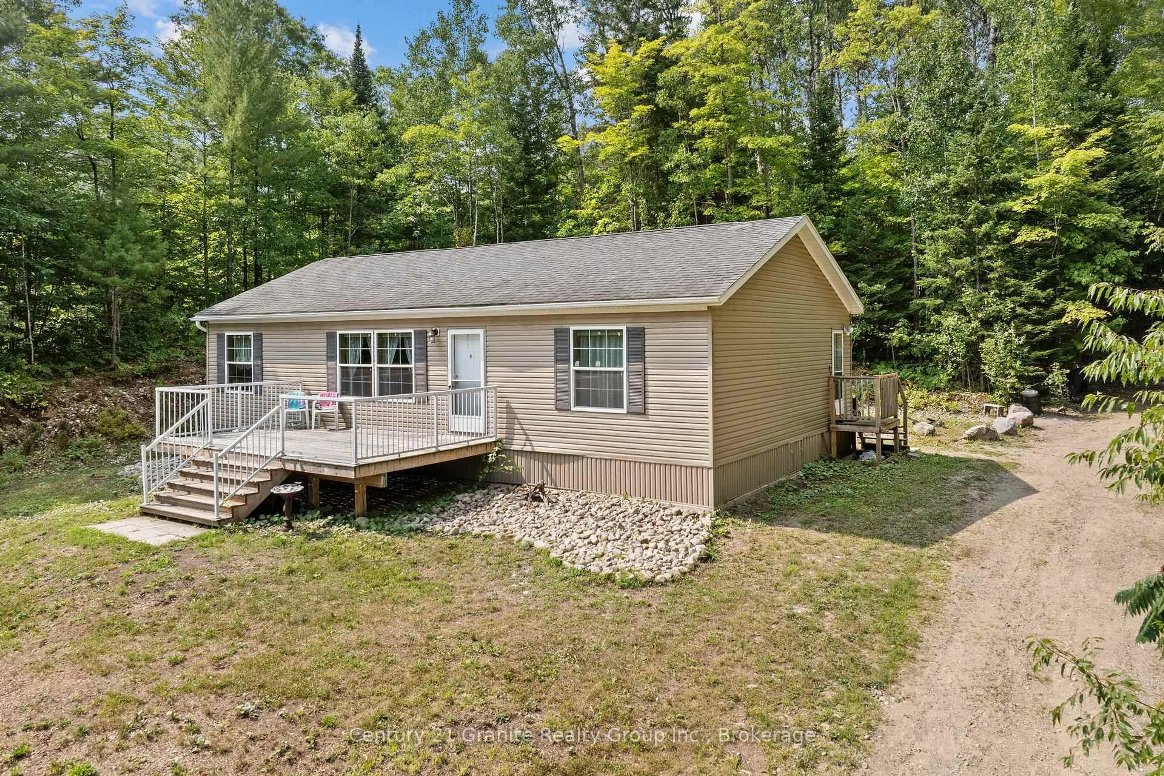 A pic from outside/outdoor area/front of a property/back of a property/a pic from drone, unknown for 2275 Kennisis Lake Rd, Dysart et al Ontario K0M 1S0