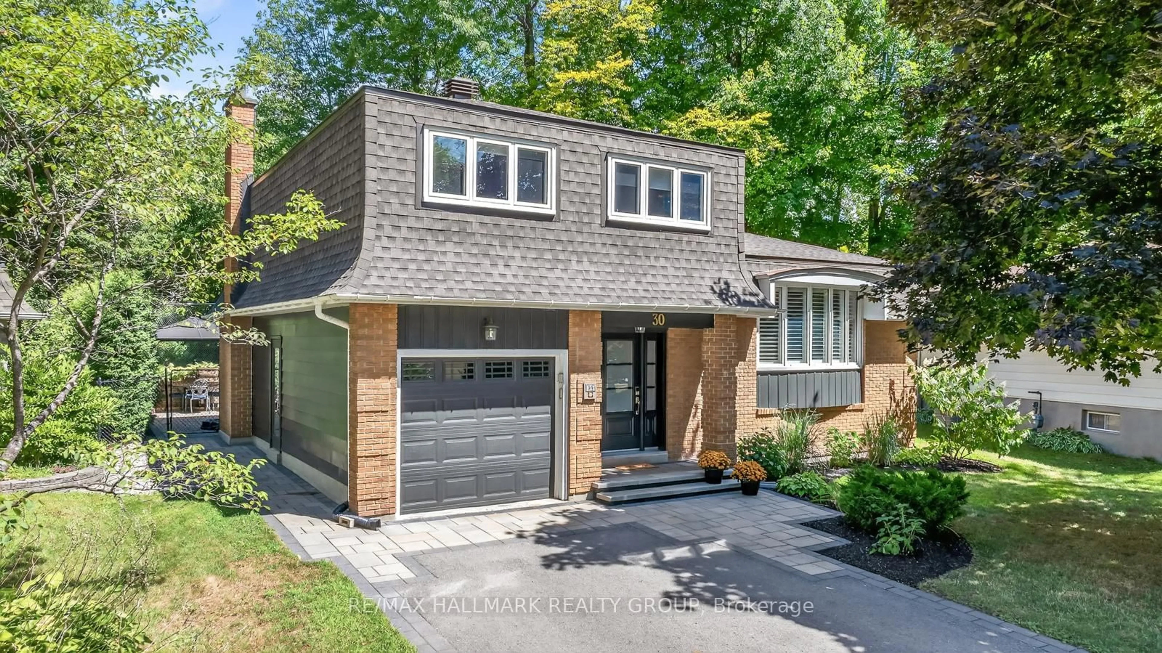 Home with brick exterior material, street for 30 Oakhurst Cres, Ottawa Ontario K1B 4A6