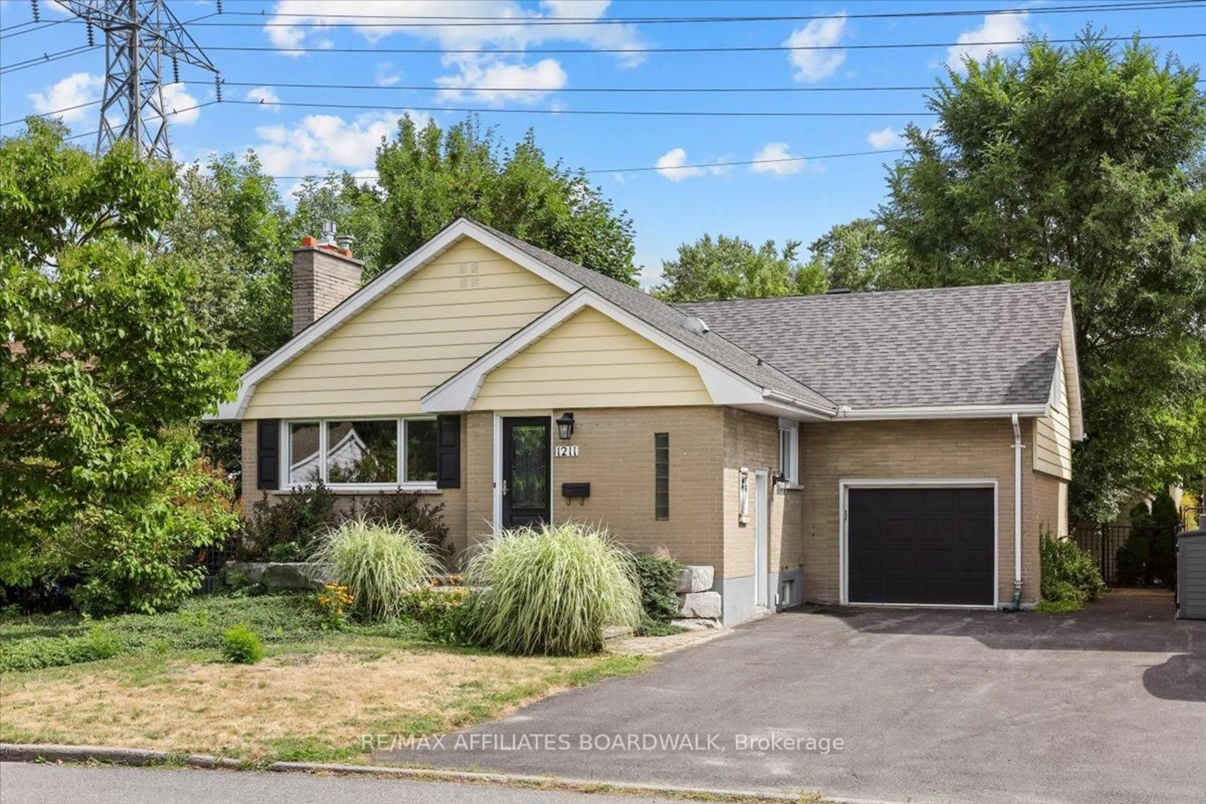 Home with vinyl exterior material, street for 1211 Woodside Dr, Carleton Place Ontario K2C 2G7