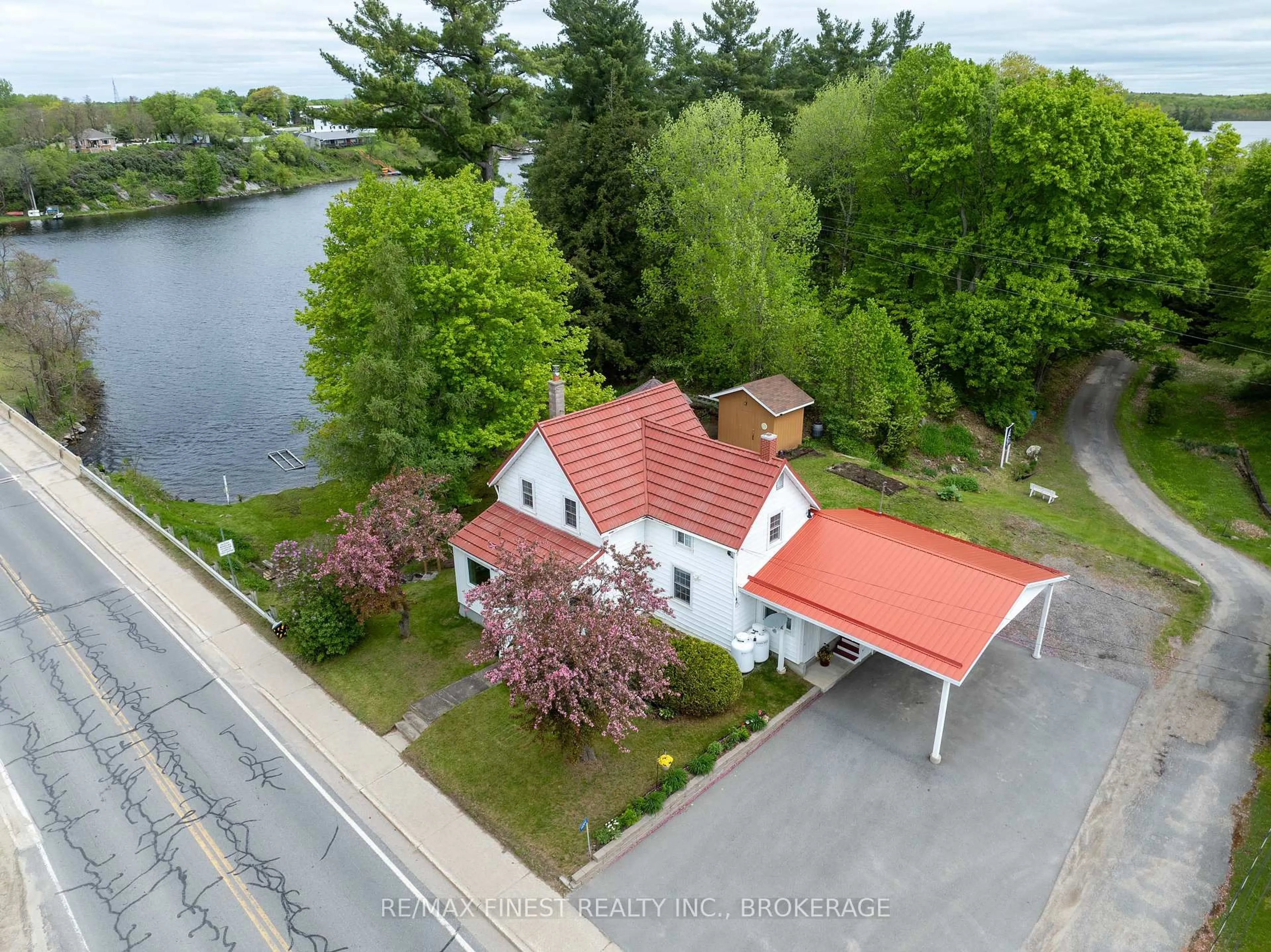 A pic from outside/outdoor area/front of a property/back of a property/a pic from drone, water/lake/river/ocean view for 14064 Road 38, Sharbot Lake Ontario K0H 2P0