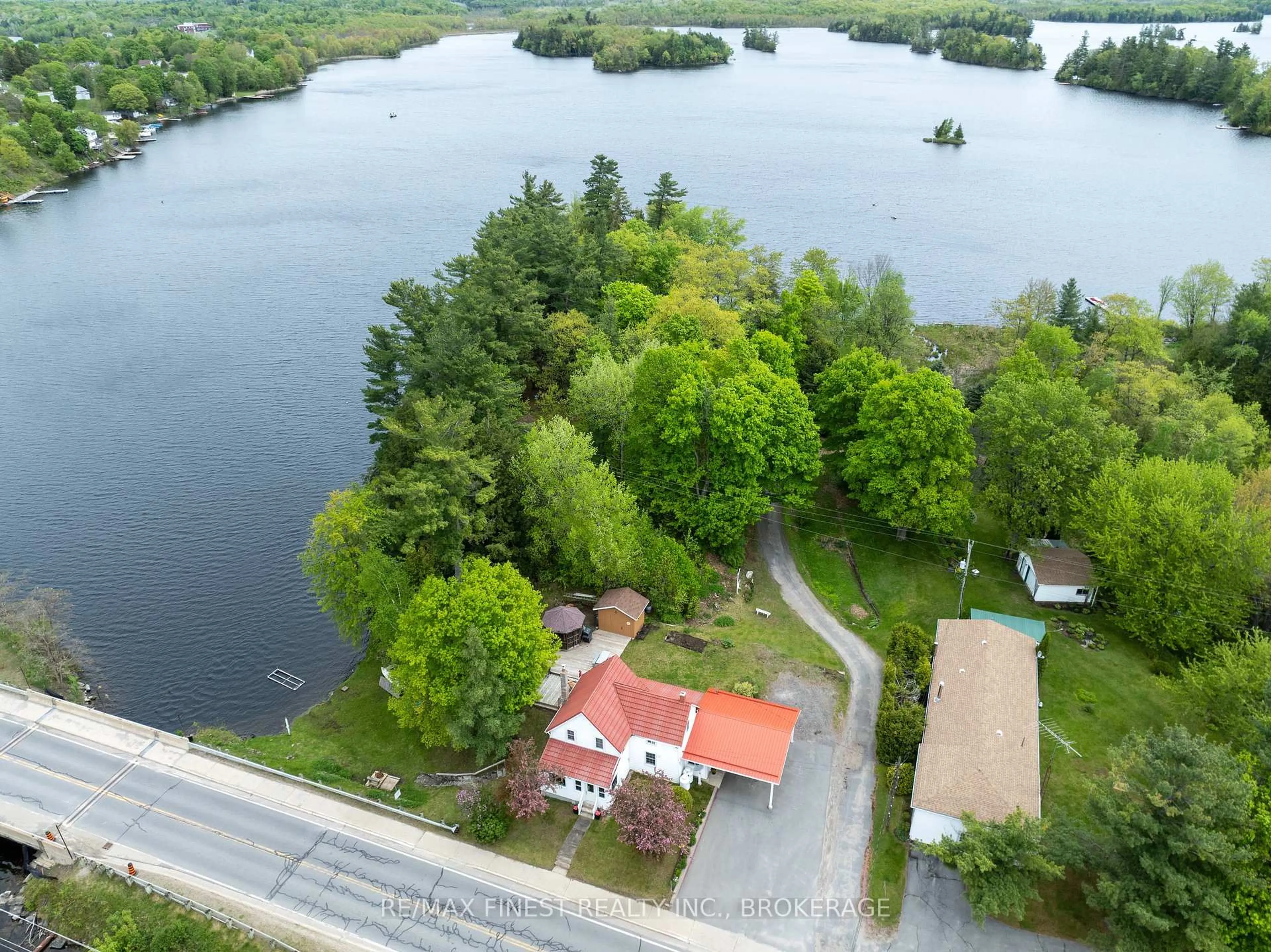 A pic from outside/outdoor area/front of a property/back of a property/a pic from drone, water/lake/river/ocean view for 14064 Road 38, Sharbot Lake Ontario K0H 2P0