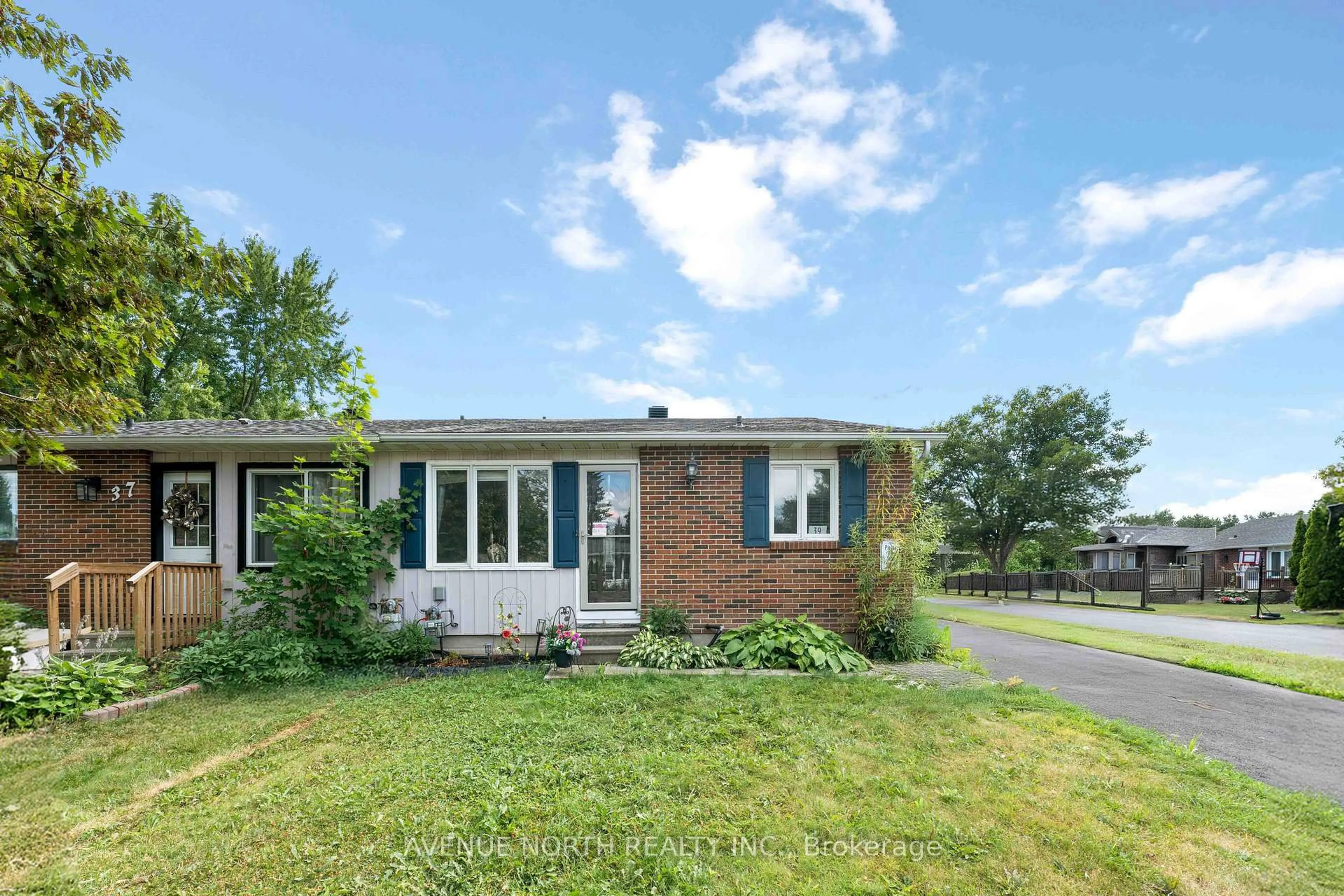 Home with brick exterior material, street for 39 Ballantrae Way, Ottawa Ontario K2L 1N3