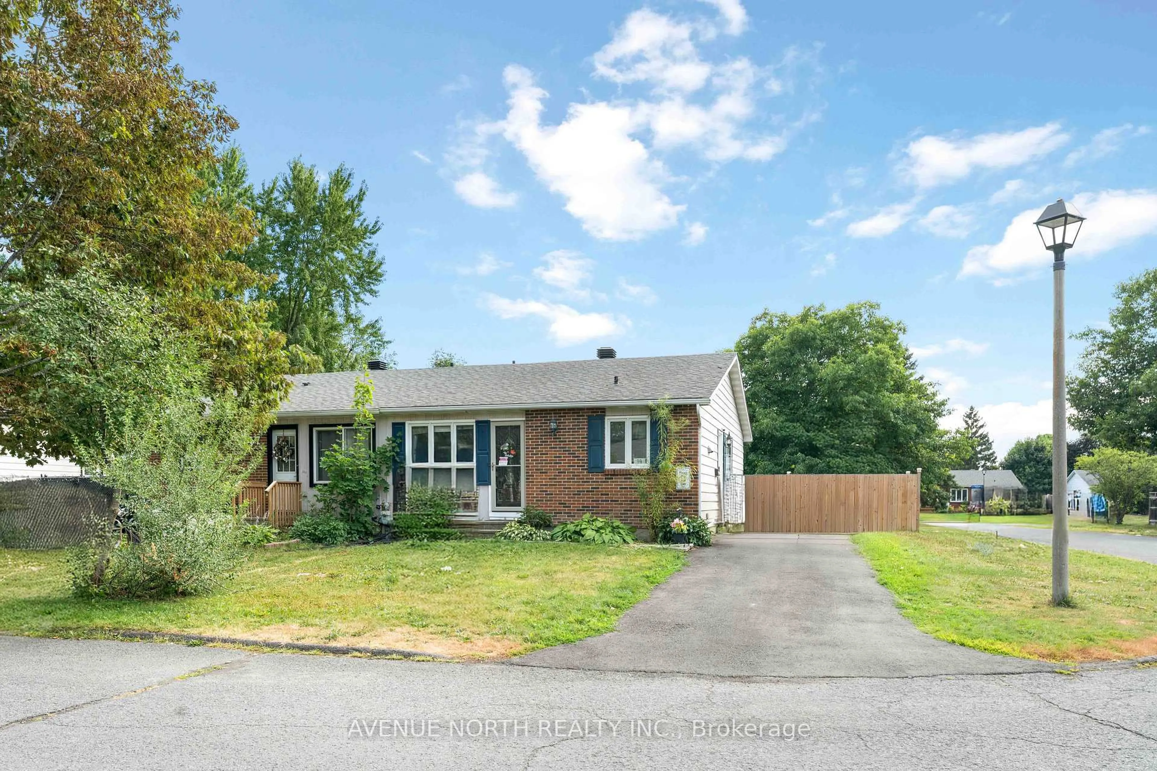 Home with brick exterior material, street for 39 Ballantrae Way, Ottawa Ontario K2L 1N3