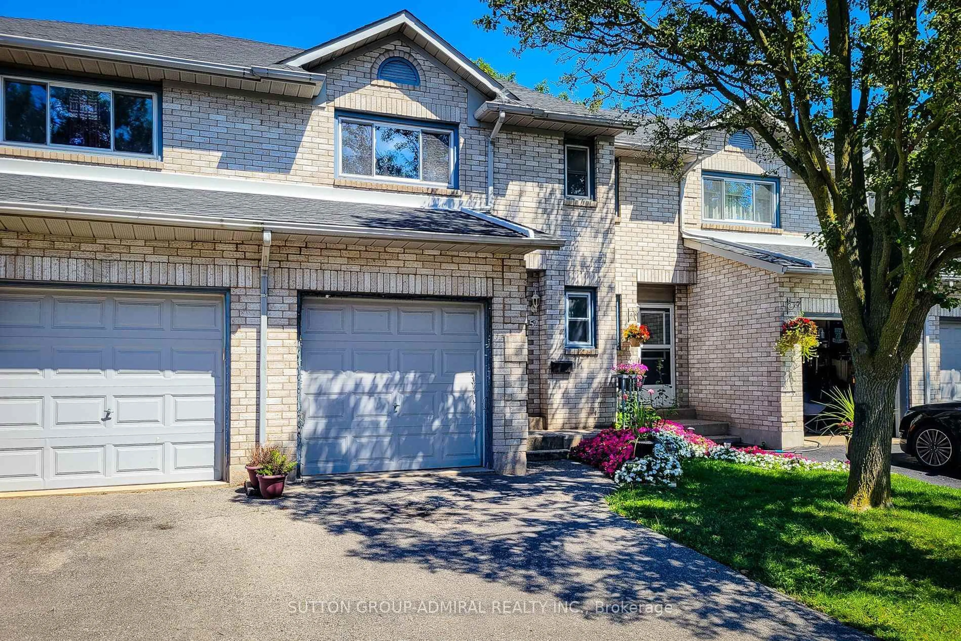 Home with brick exterior material, street for 2 Royalwood Crt #52, Hamilton Ontario L8E 4Z1