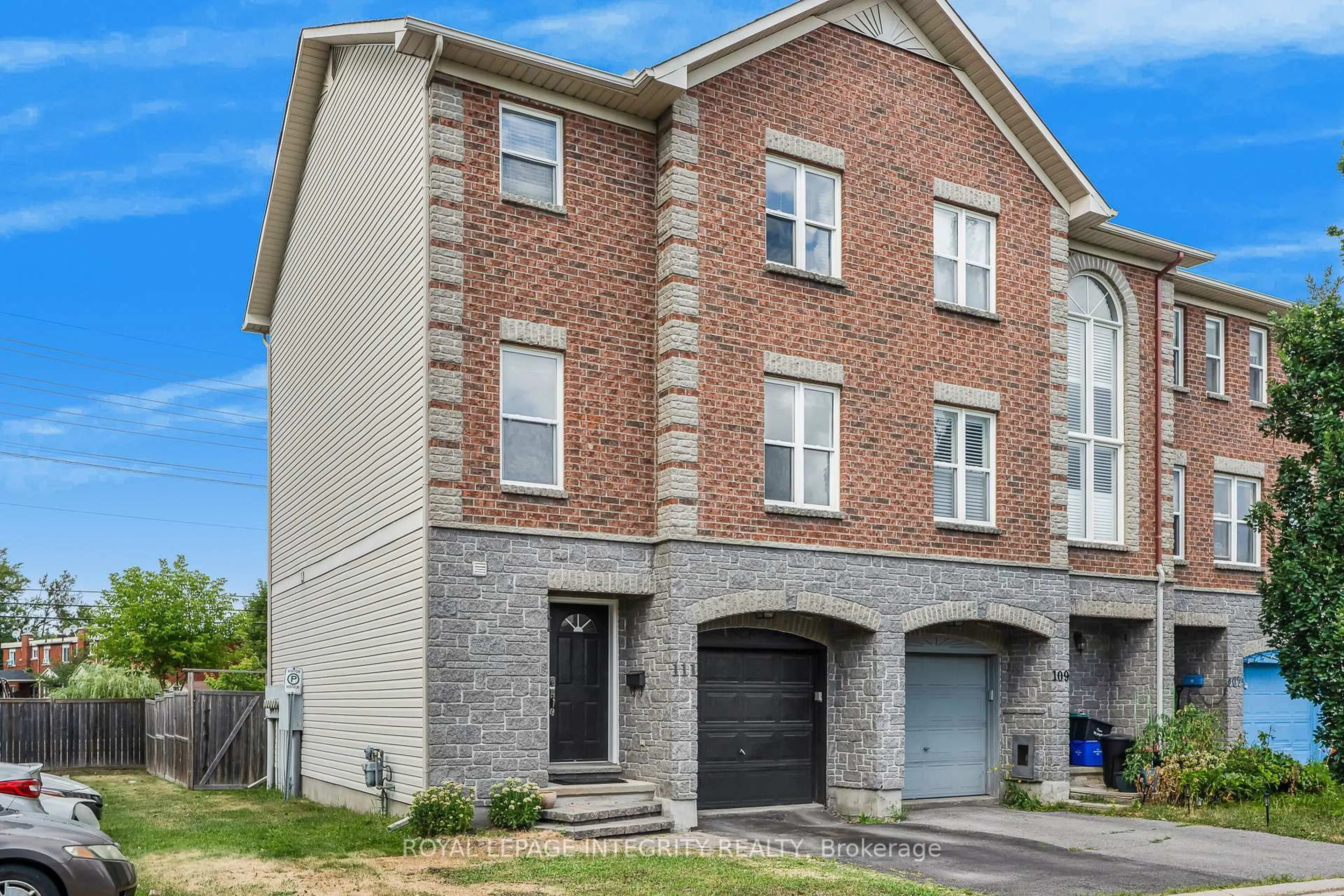Home with brick exterior material, street for 111 Arcola Private, Ottawa Ontario K1K 4W9