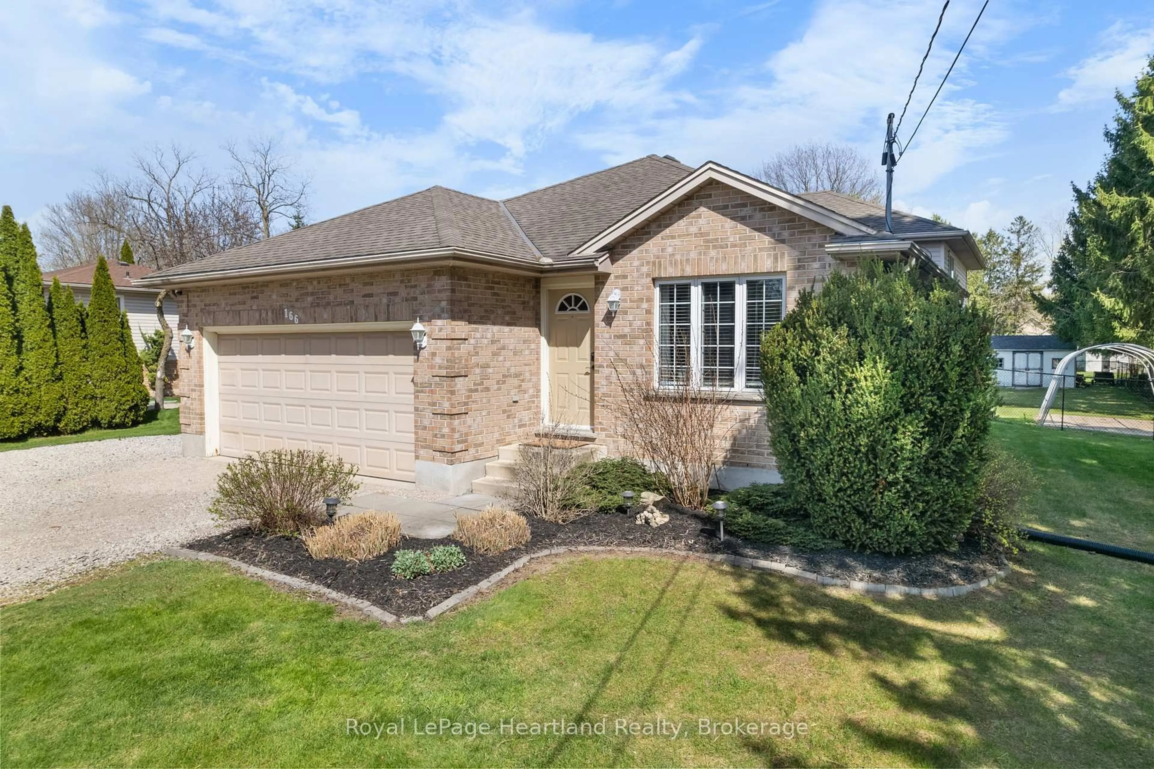 Home with brick exterior material, street for 166 West Park Dr, North Middlesex Ontario N0M 2K0